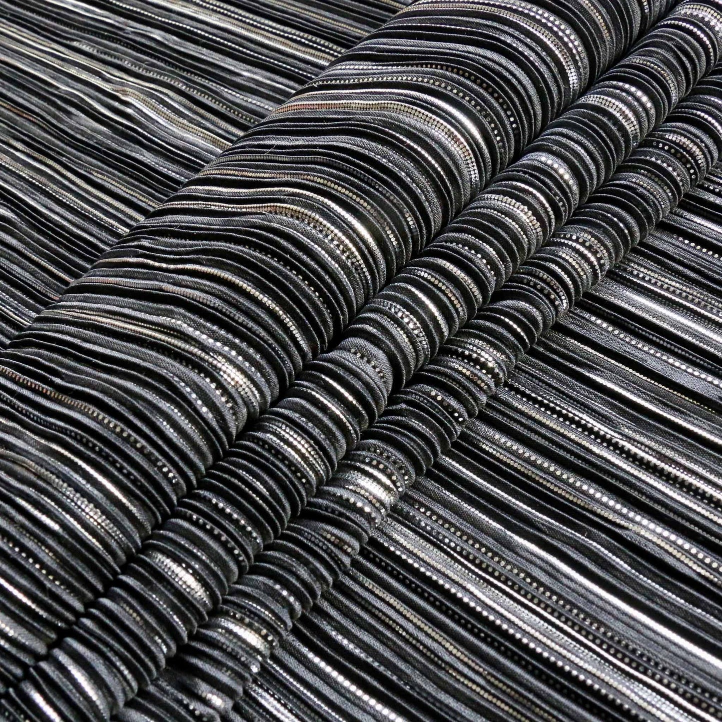 pleated plisse dress fabric withe silver dot pattern on black