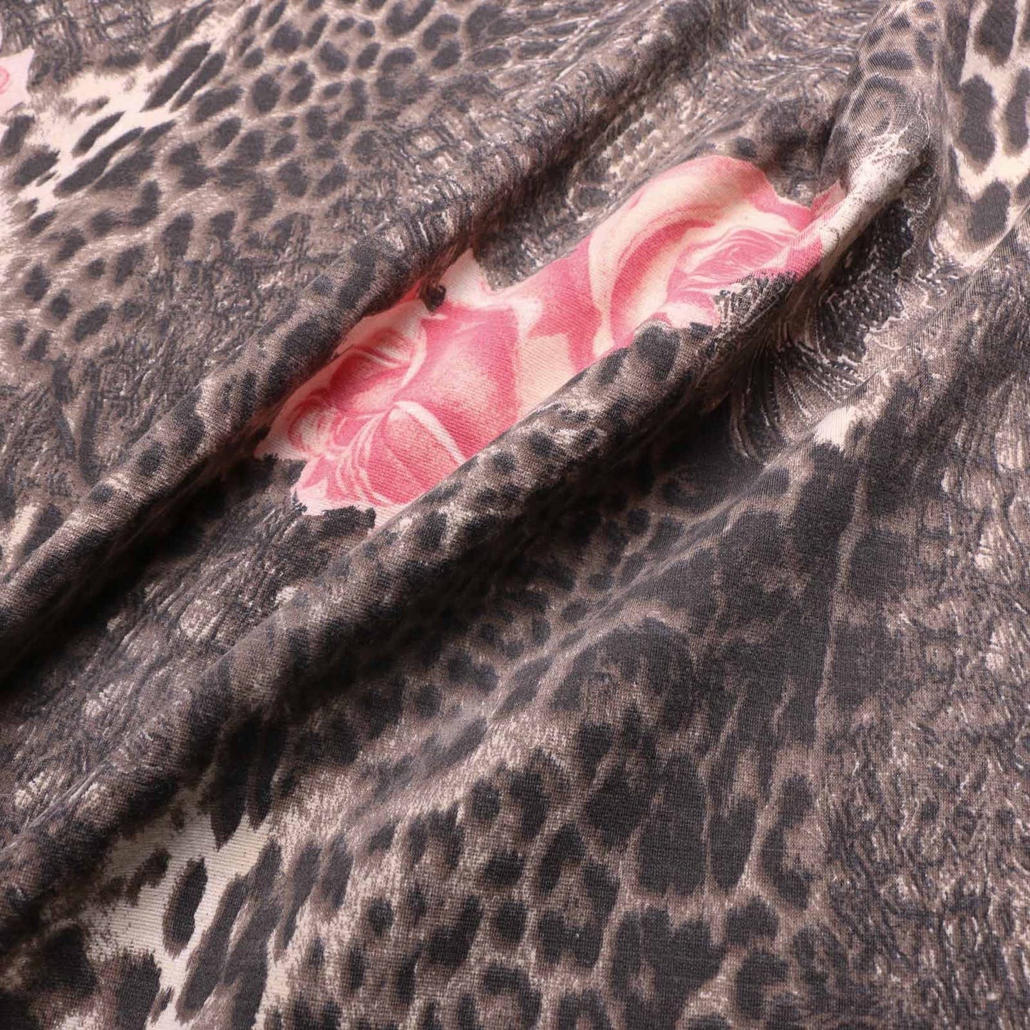 animal print ponte roma jersey knit dress fabric in pink and brown leopard skin with roses