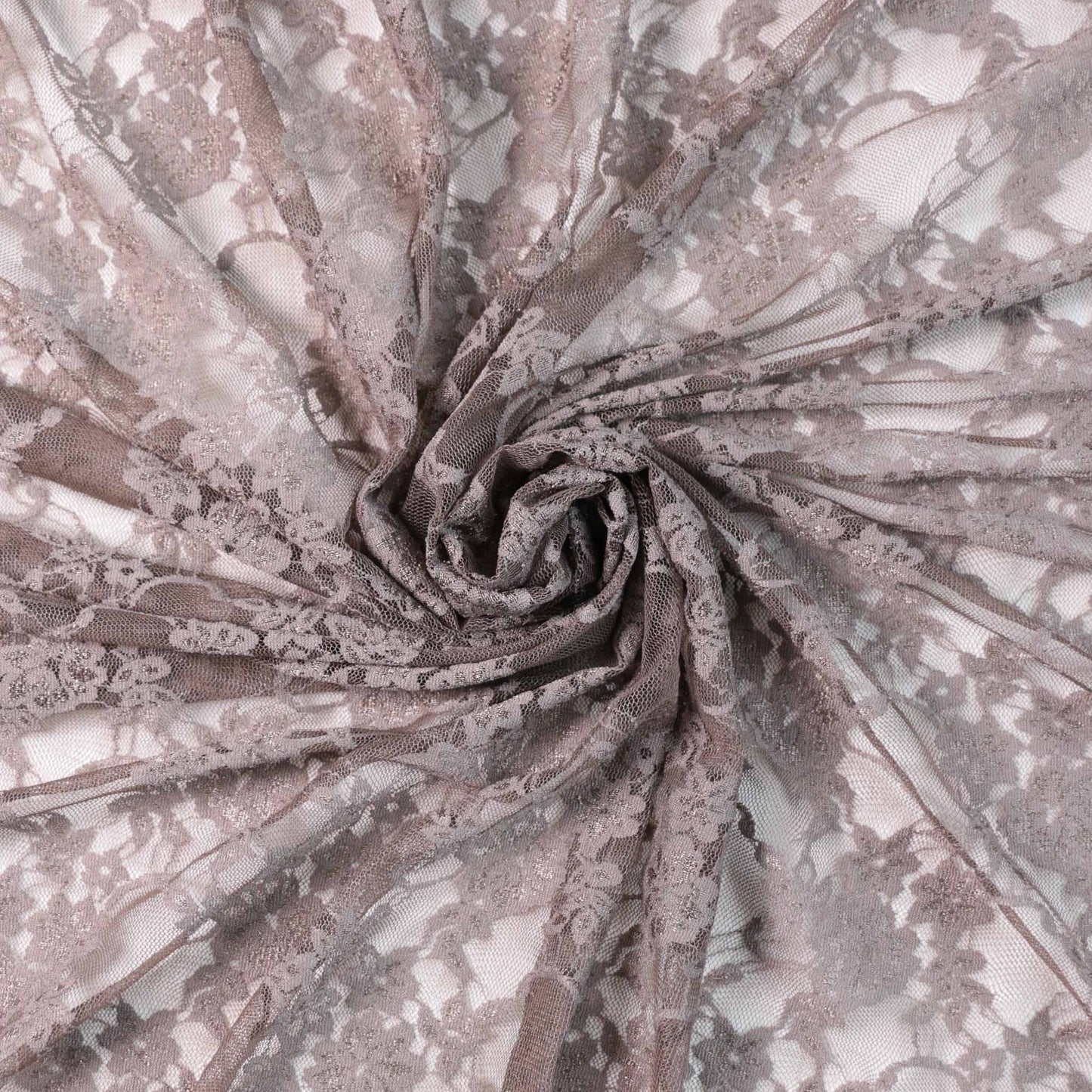 beige stretchy lace dressmaking fabric with floral design