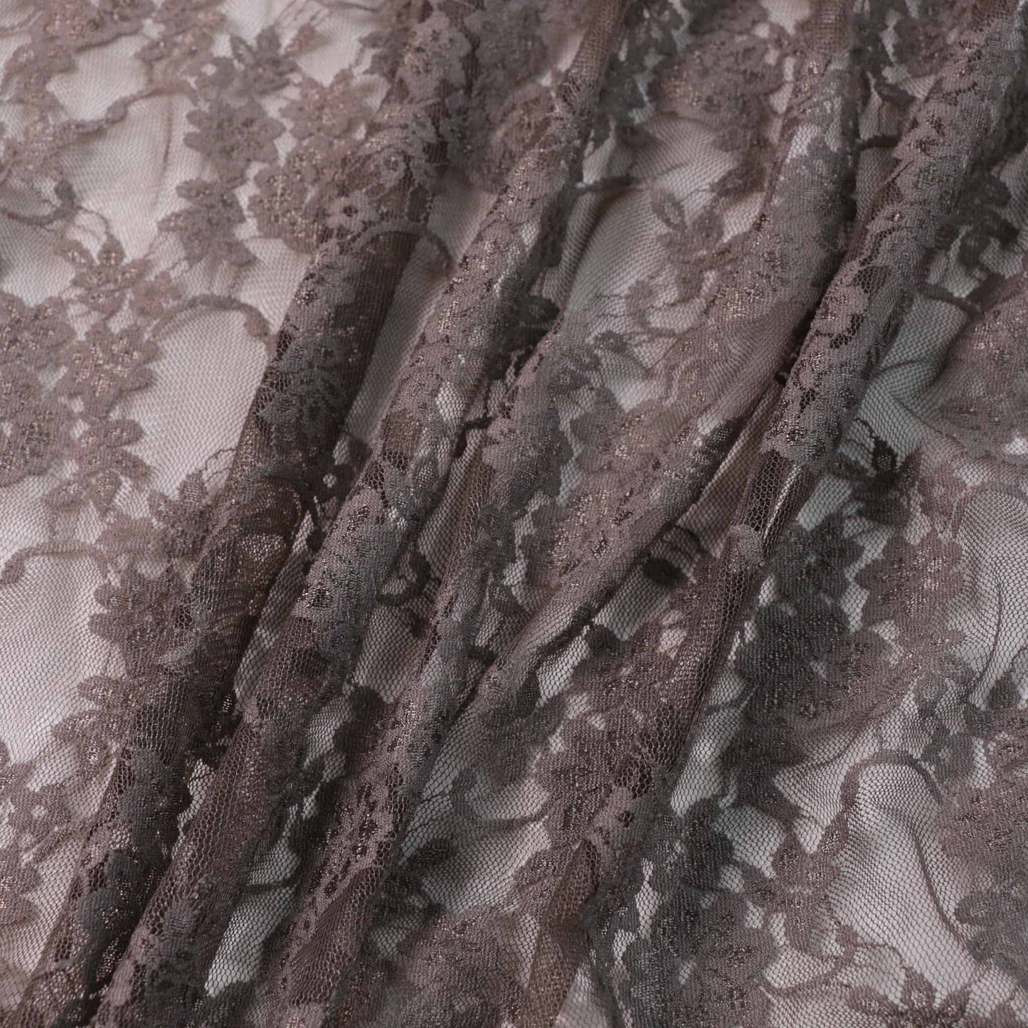 stretchy beige dressmaking lace fabric with floral design