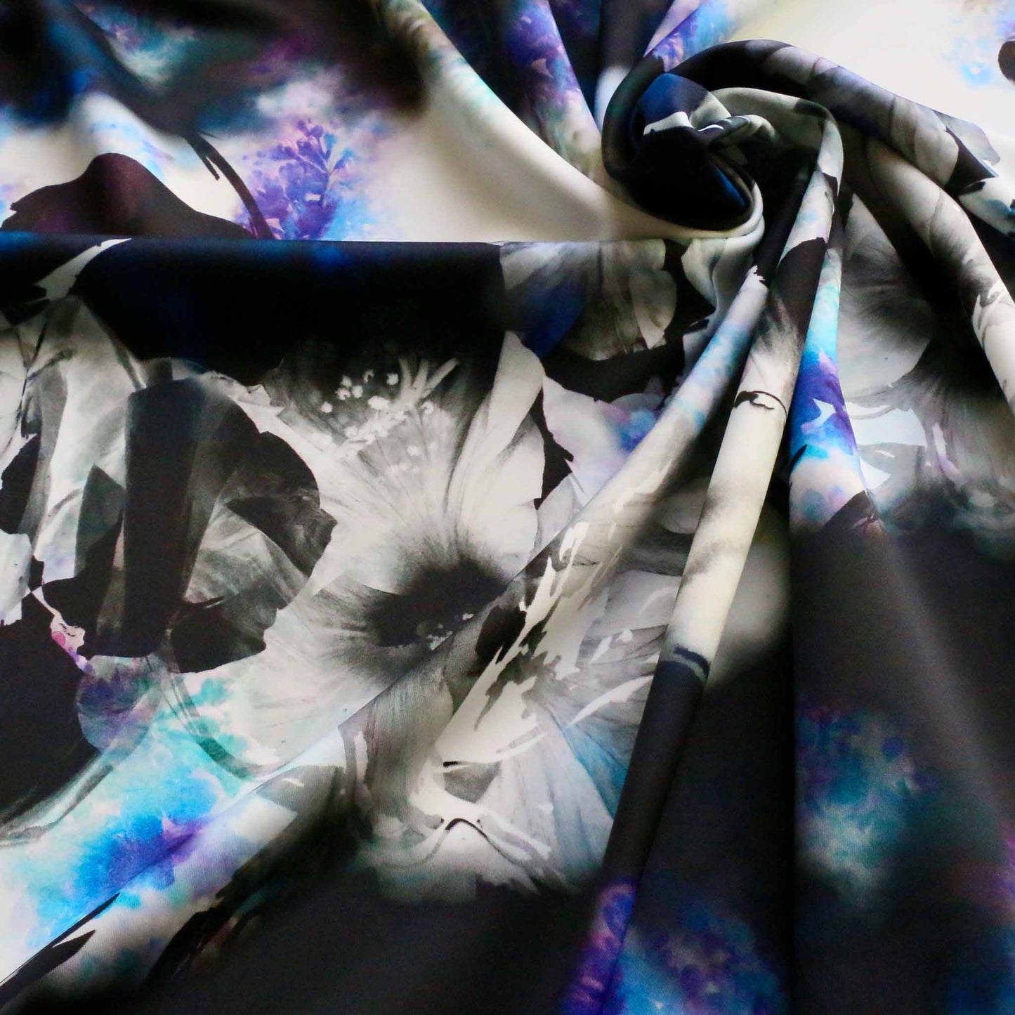 black and blue scuba dressmaking fabric stretchy with floral print