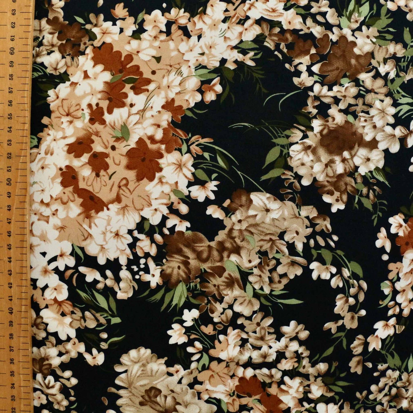 metre navy chiffon polyester synthetic dressmaking fabric with brown and light beige printed floral design