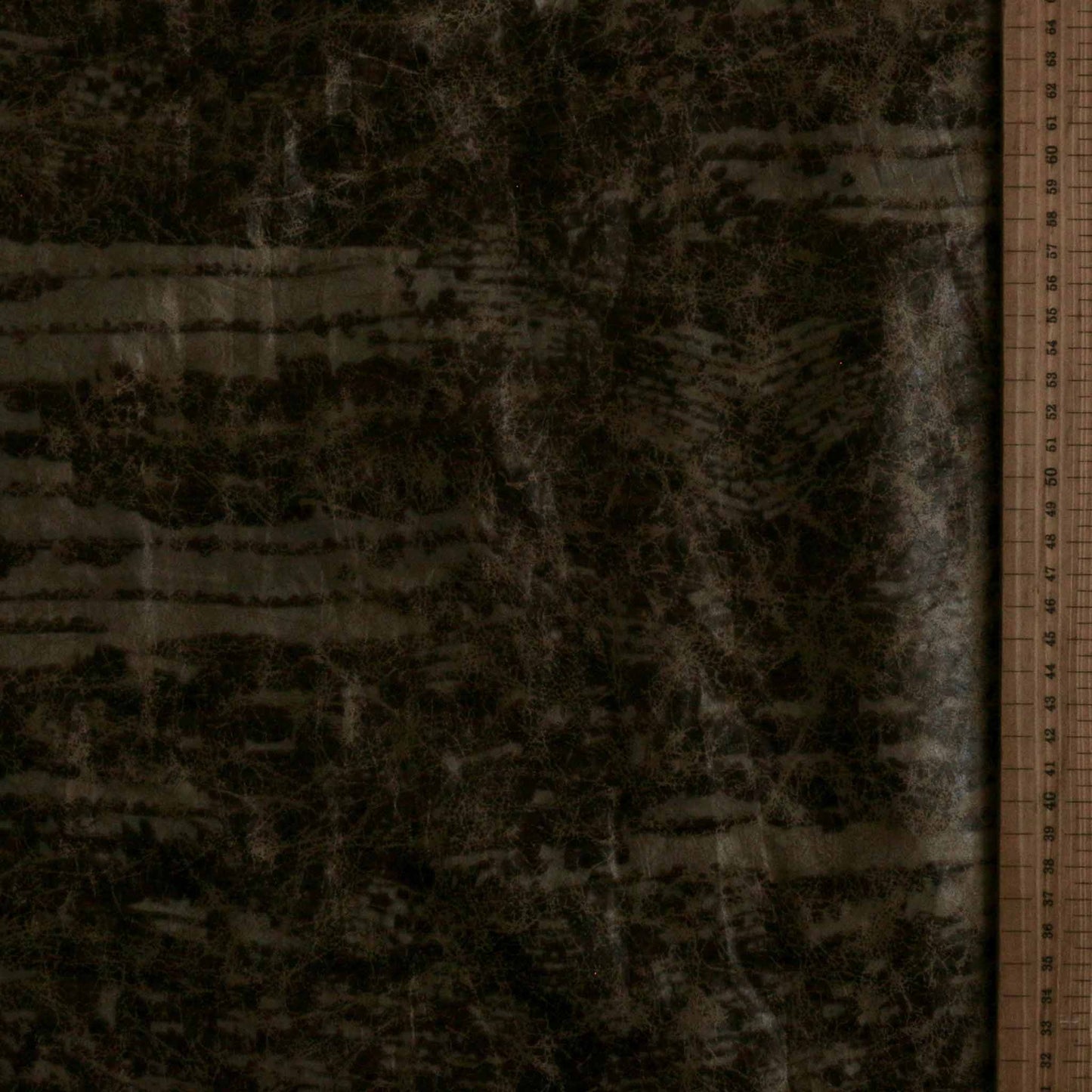 metre worn effect black and gold taffeta dressmaking fabric
