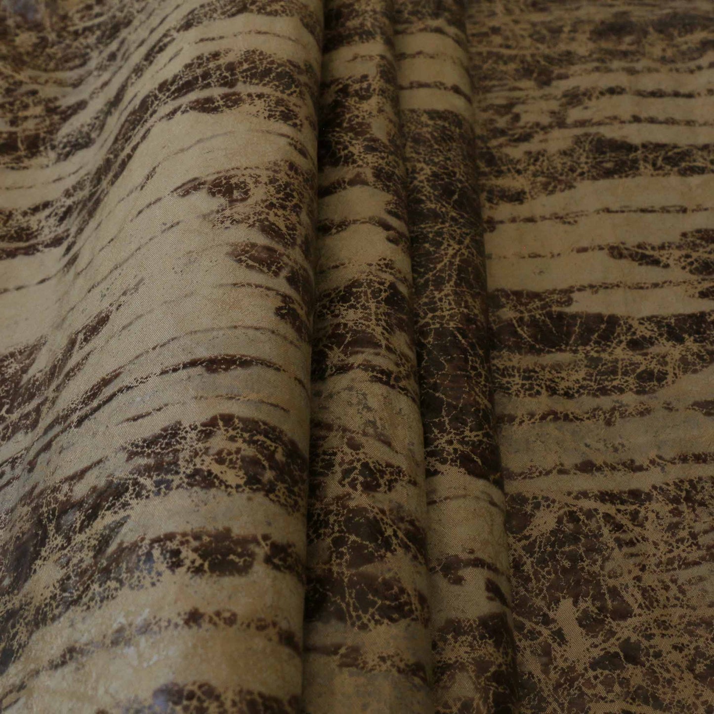 black and gold taffeta fabric for dressmaking with vintage worn effect look
