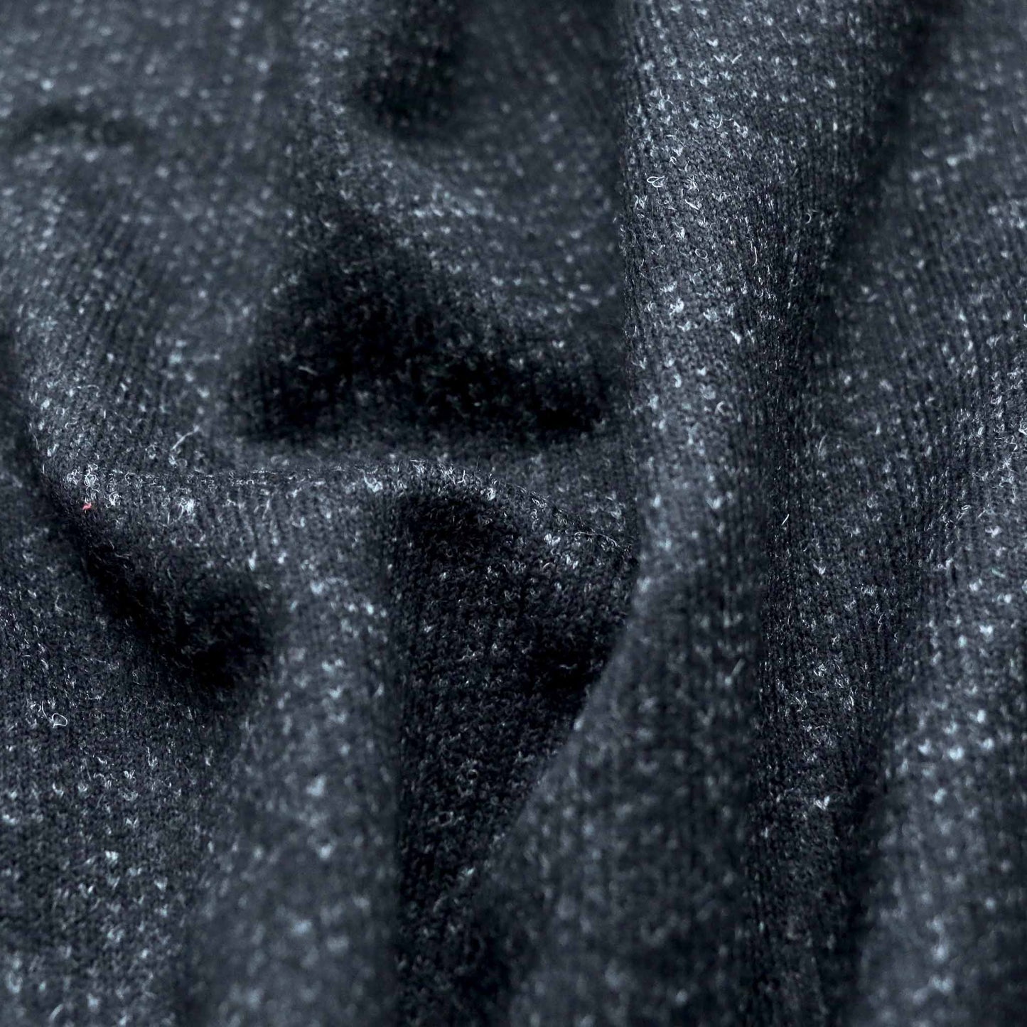 black and grey wool jersey knit dressmaking fabric with felt backing