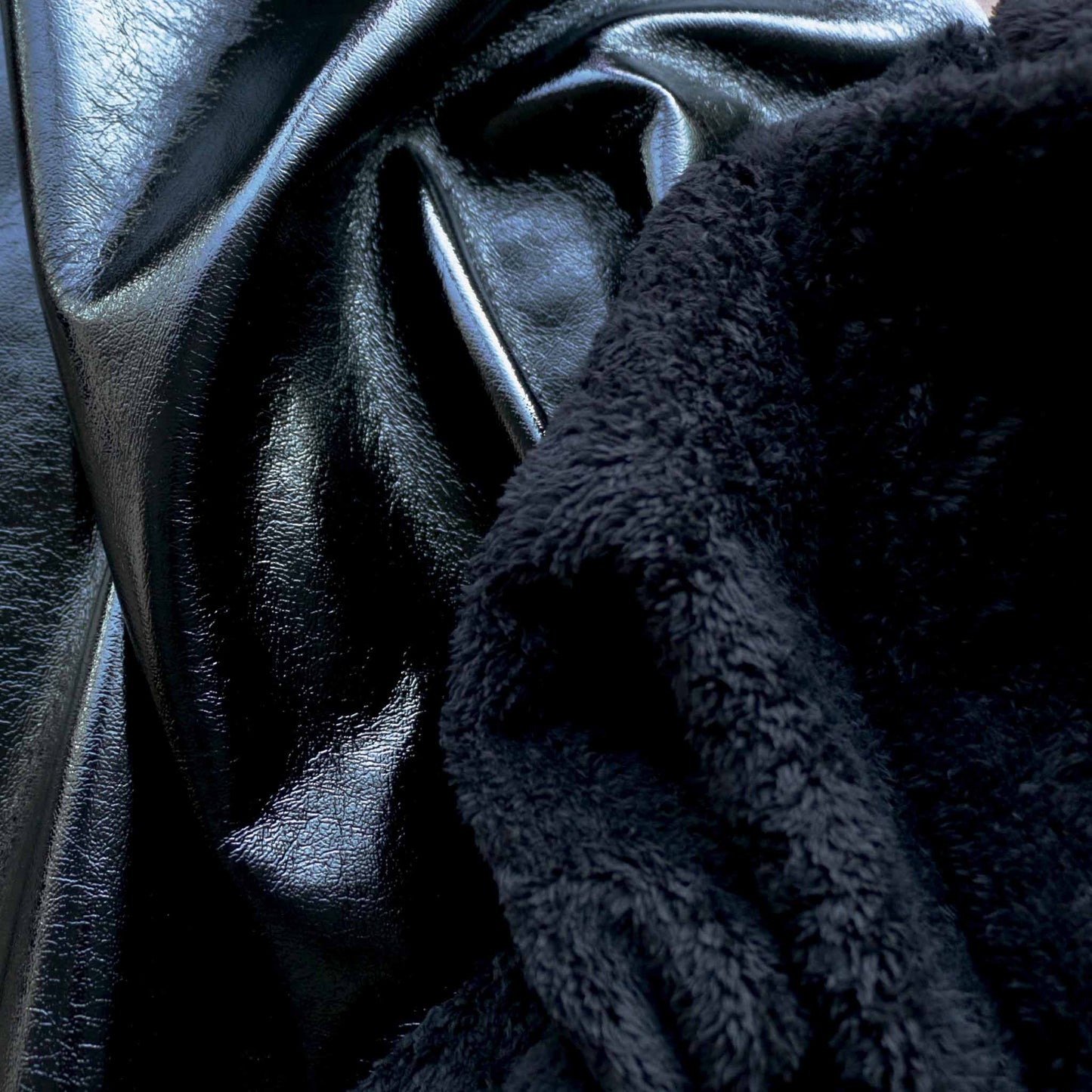 black pvc and bonded sherpa fleece backing dressmaking fabric