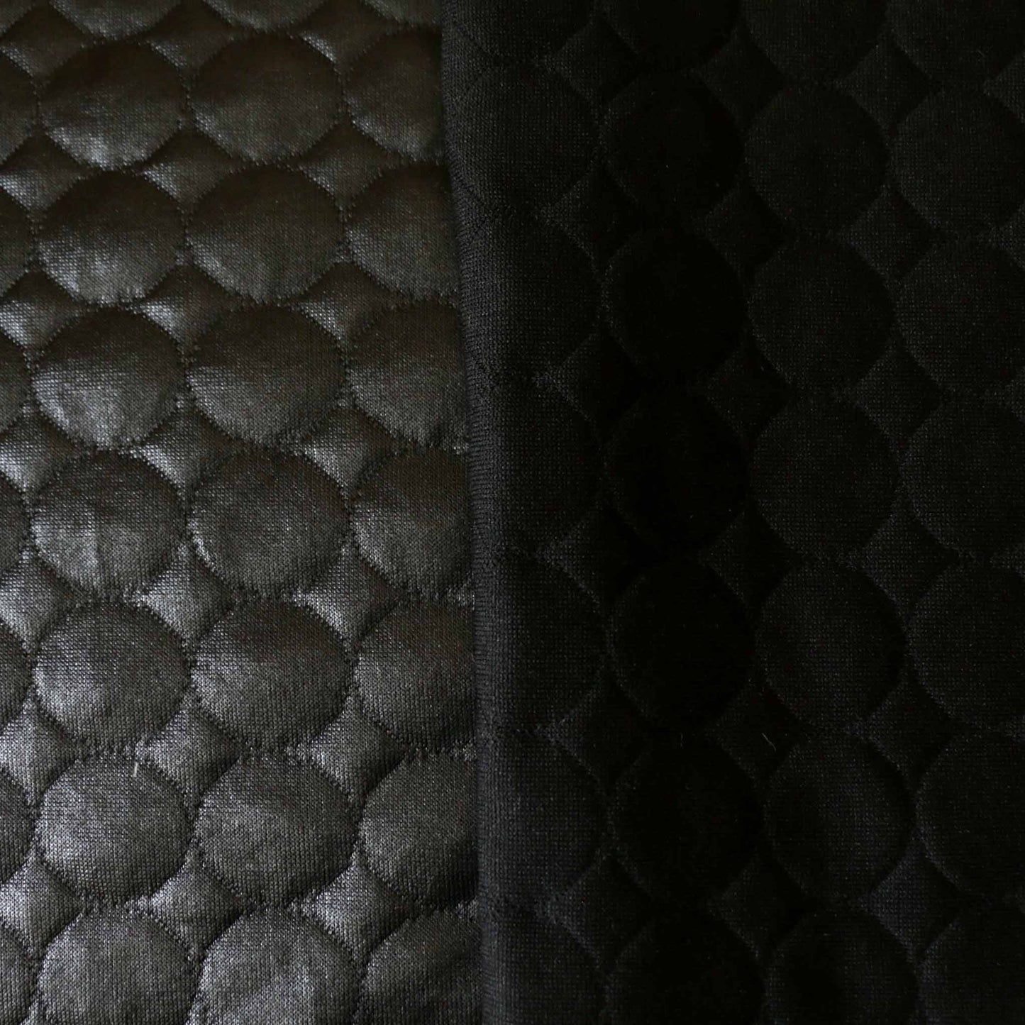 black shiny jersey quilting dressmaking fabric with circle design