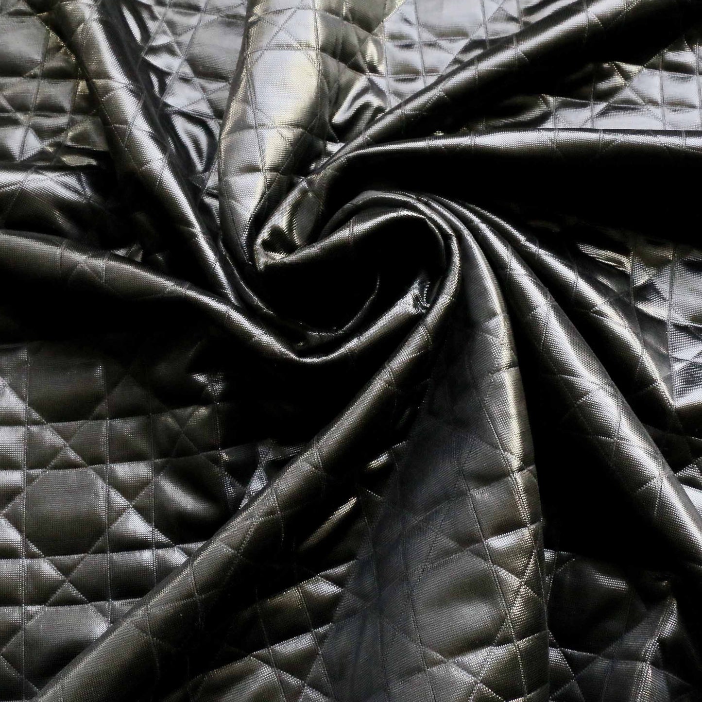 black shiny jersey quilting dressmaking fabric with geometric design