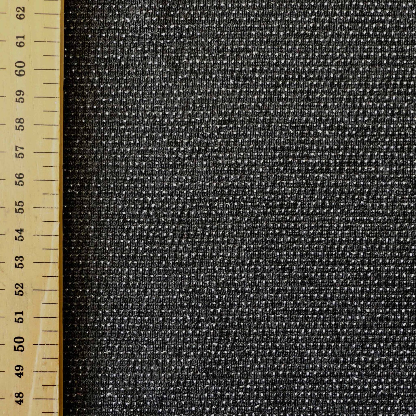metre black and silver dotted slinky stretchy jersey dressmaking fabric