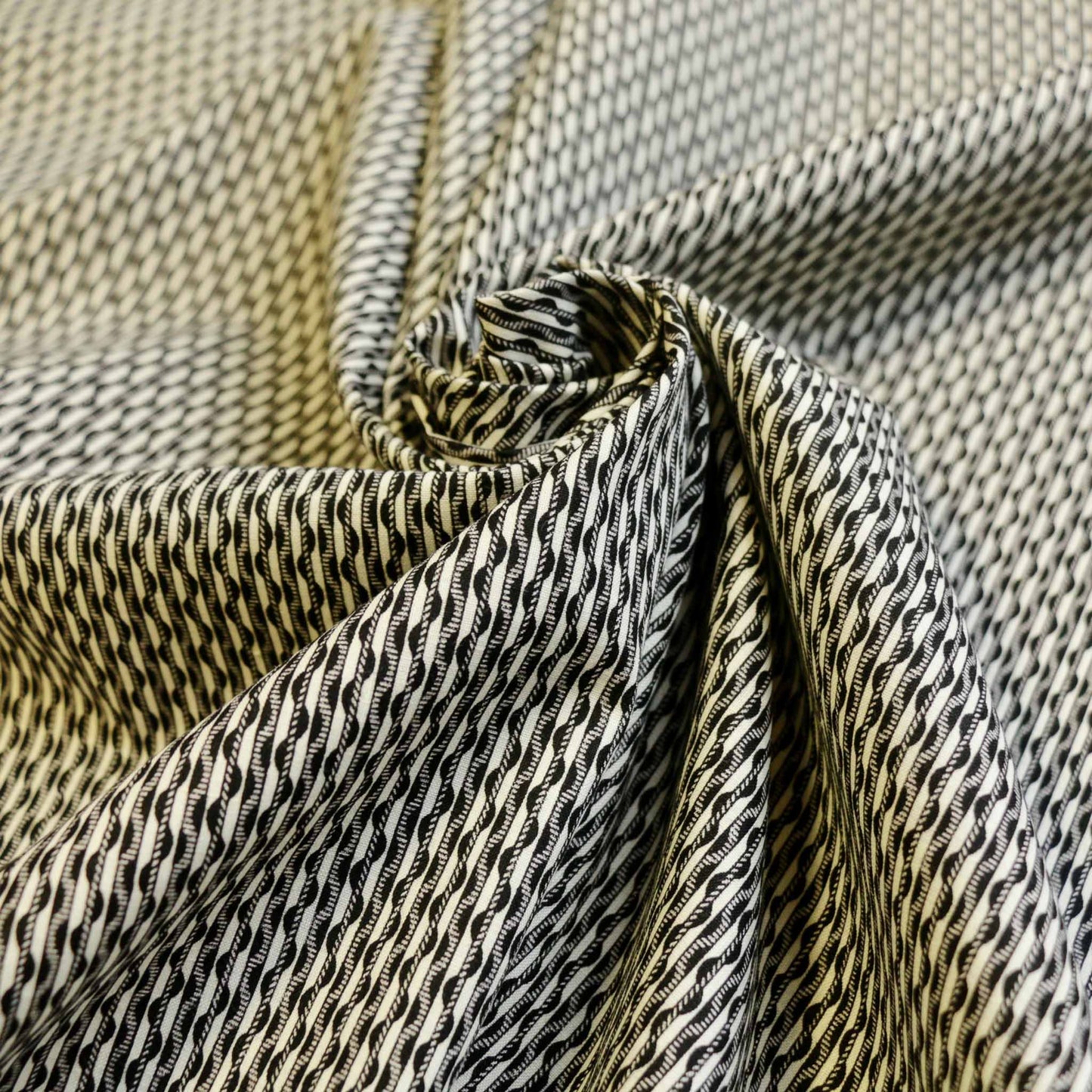 black and white vintage cotton poplin with retro stripe pattern for sustainable sewing