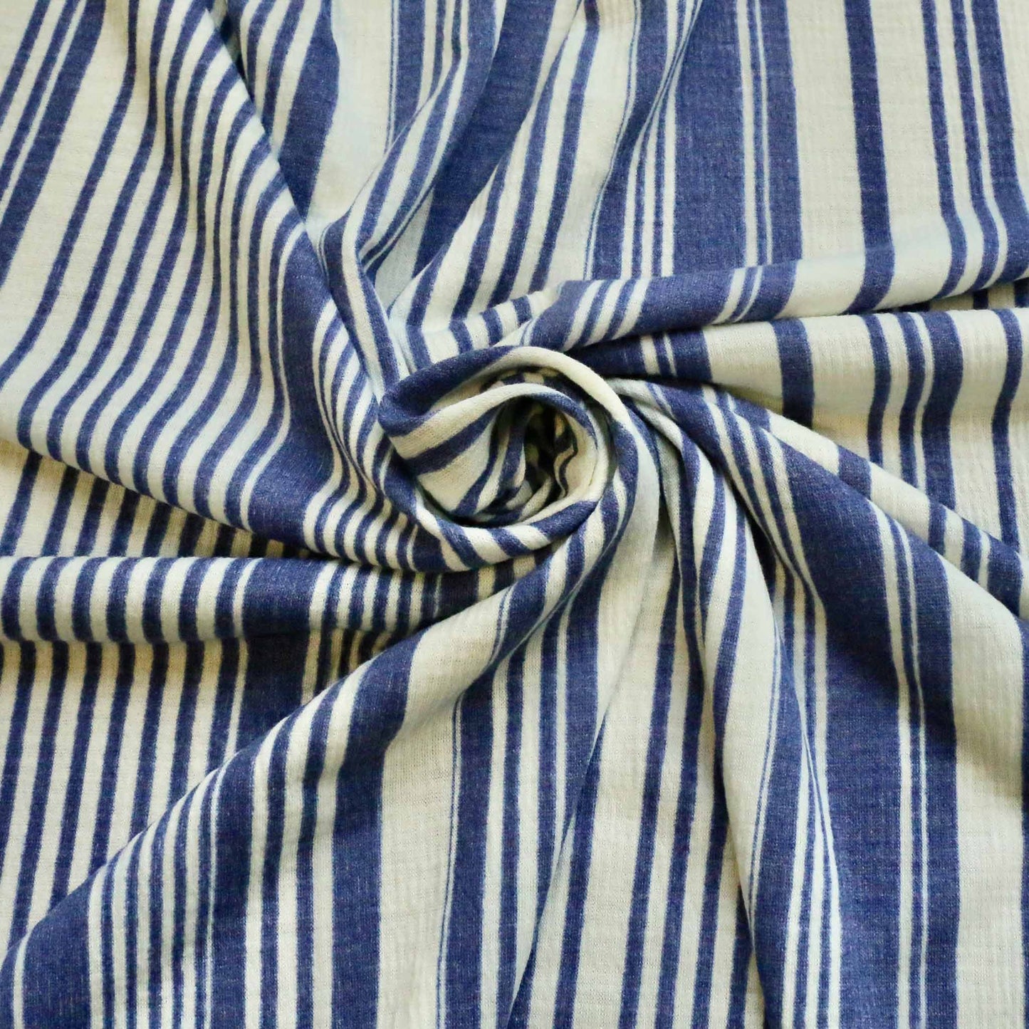 deadstock blue and white striped jersey knit viscose dressmaking fabric