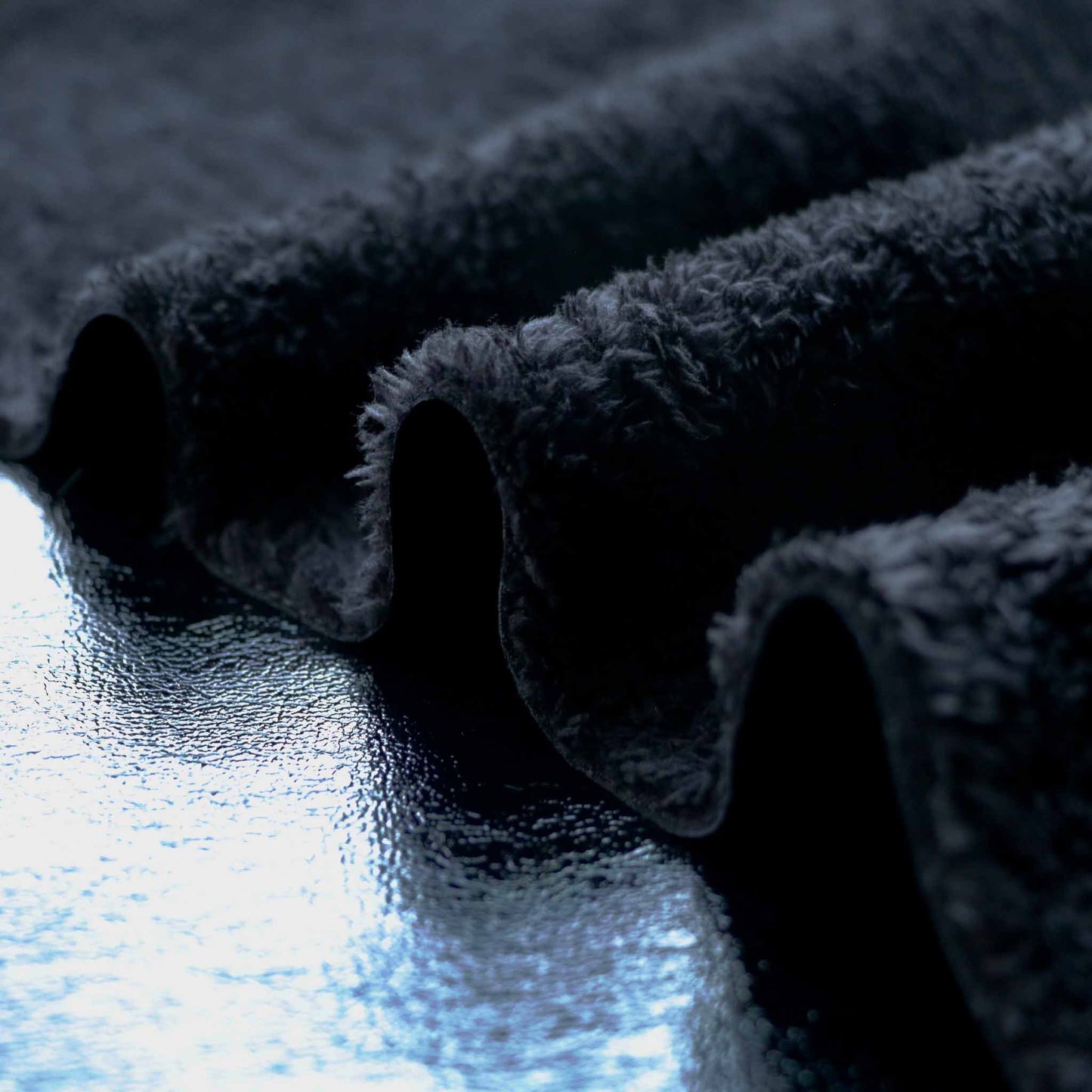 bonded black sherpa fleece with vinyl pvc dressmaking fabric