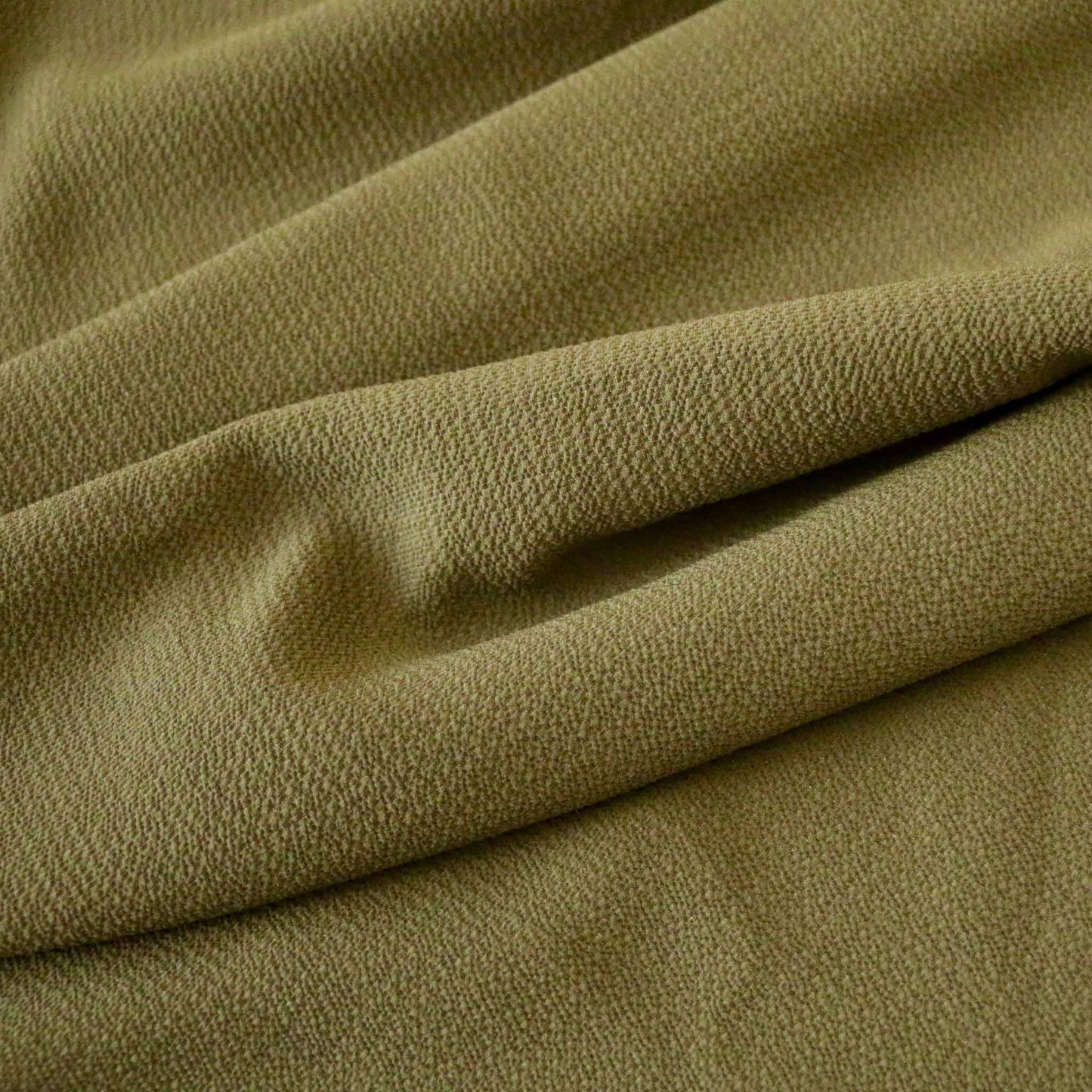light green bubble crepe dressmaking fabric