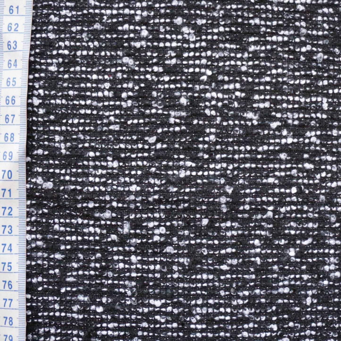 metre boucle dressmaking fabric in black with silver lurex