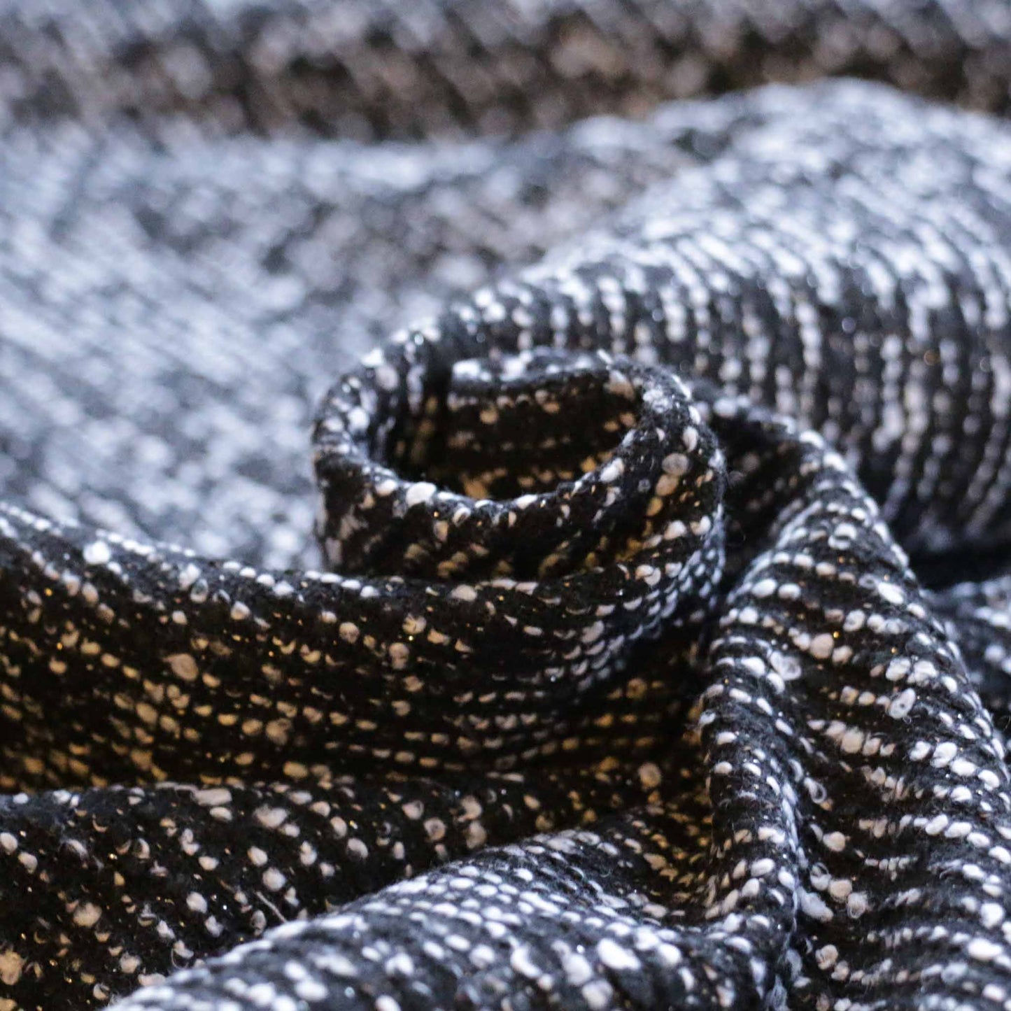 black boucle dressmaking fabric with silver lurex