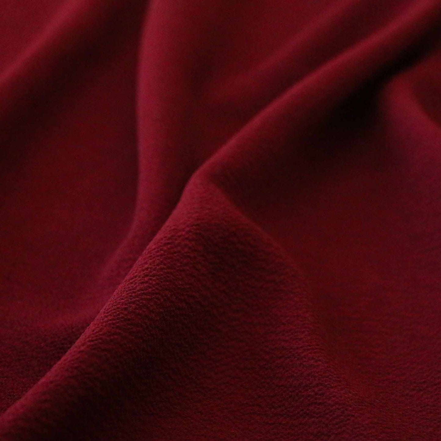 light weight bubble crepe dressmaking fabric in maroon