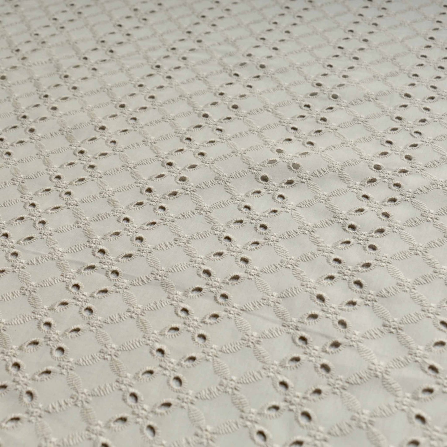4 hole cream broad anglaise dressmaking fabric with vintage look