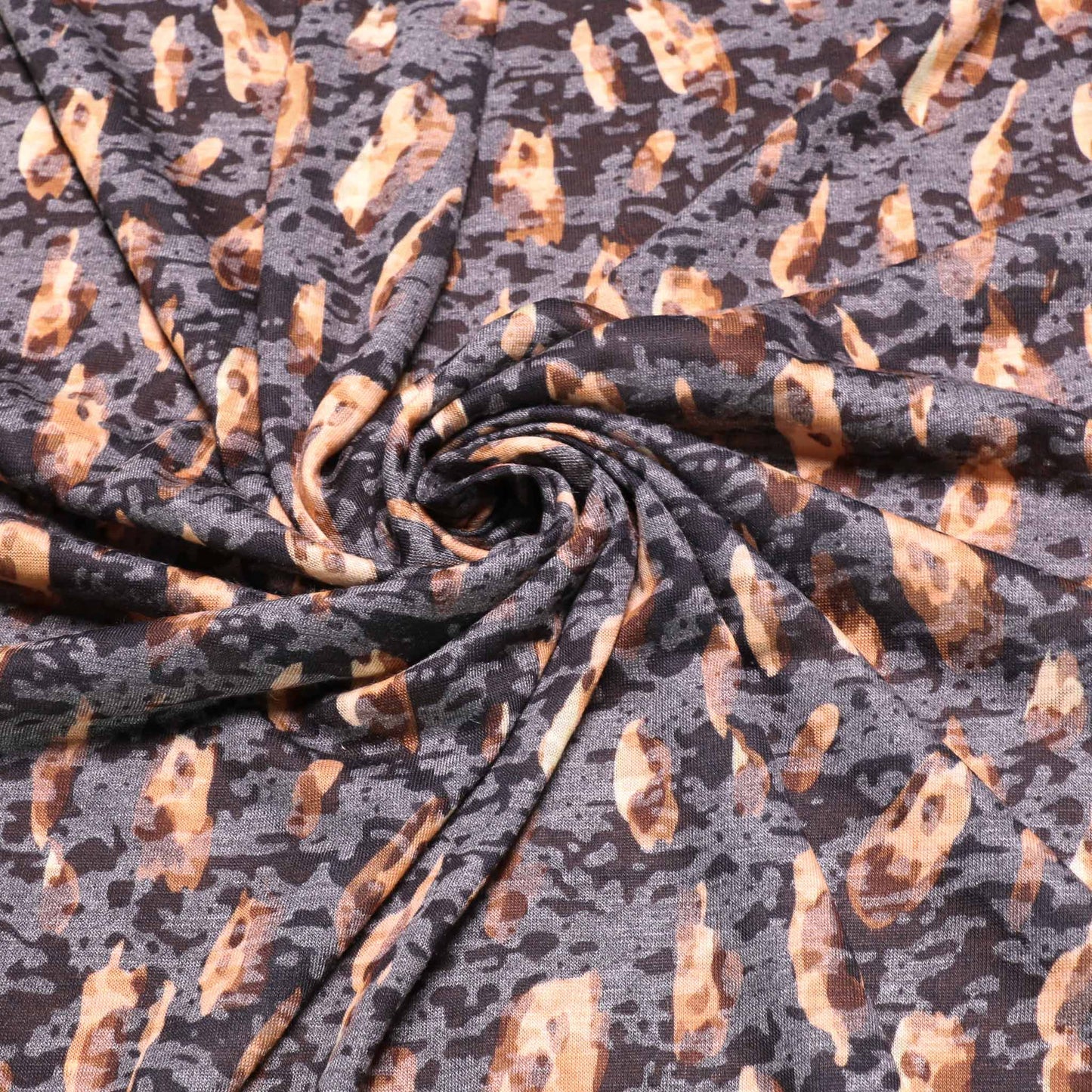 brown and beige jersey knit dress fabric with animal print