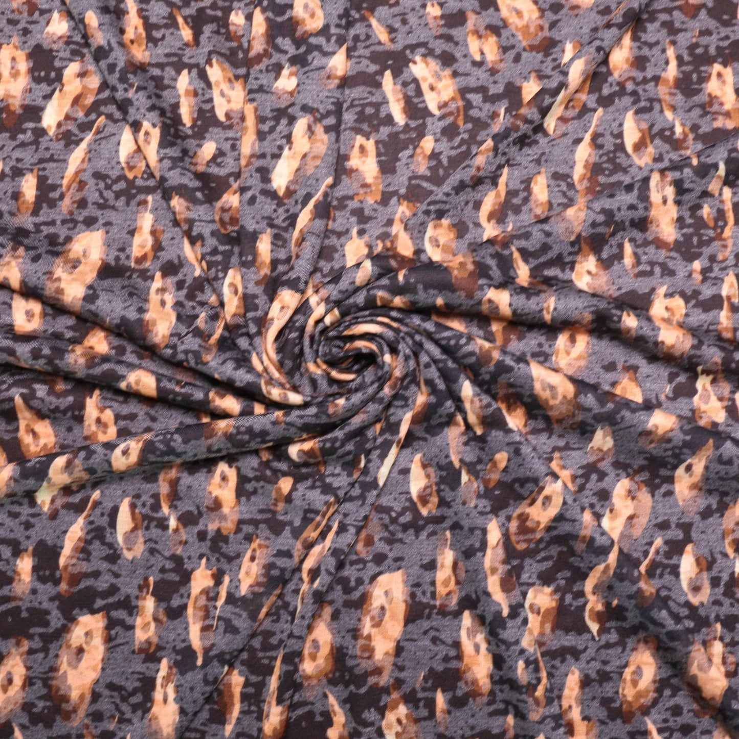 jersey knit dressmaking fabric with brown and beige animal print