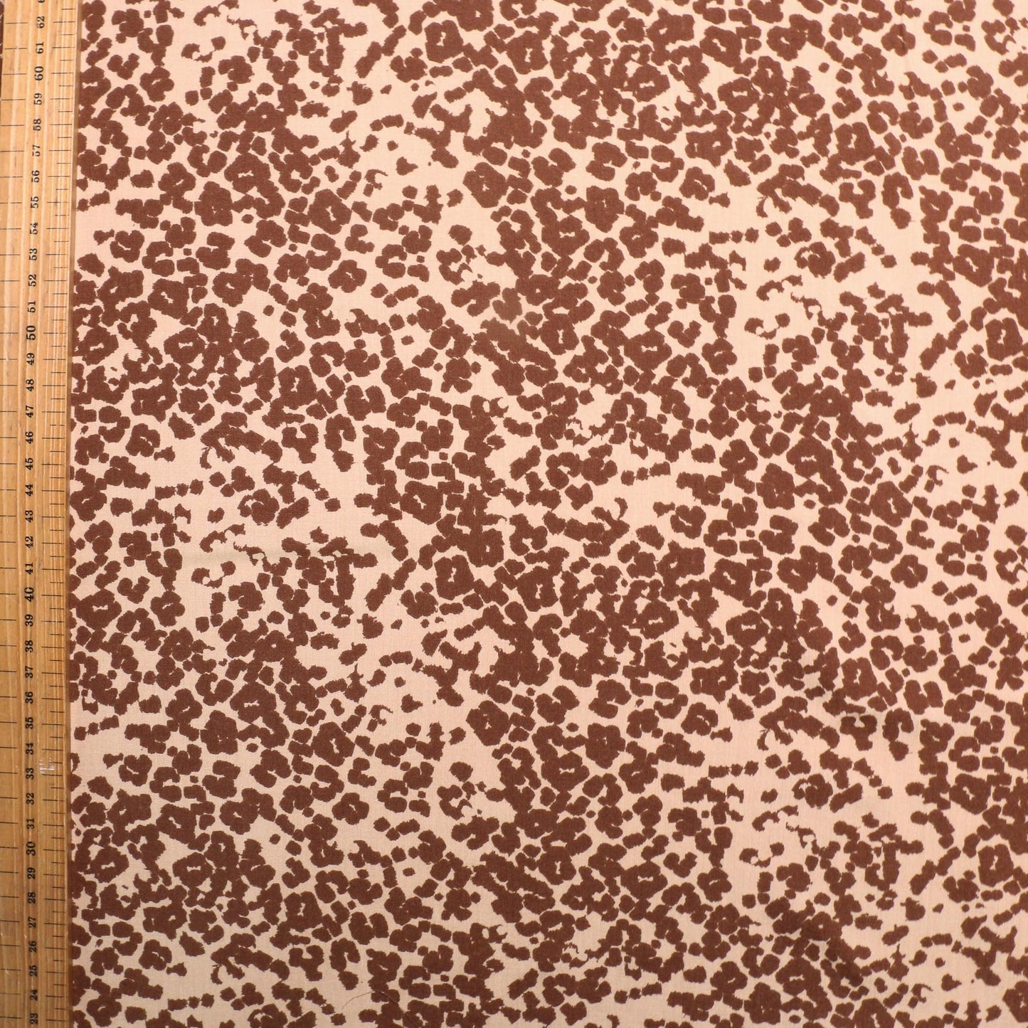 brown and beige animal print viscose challis dressmaking fabric