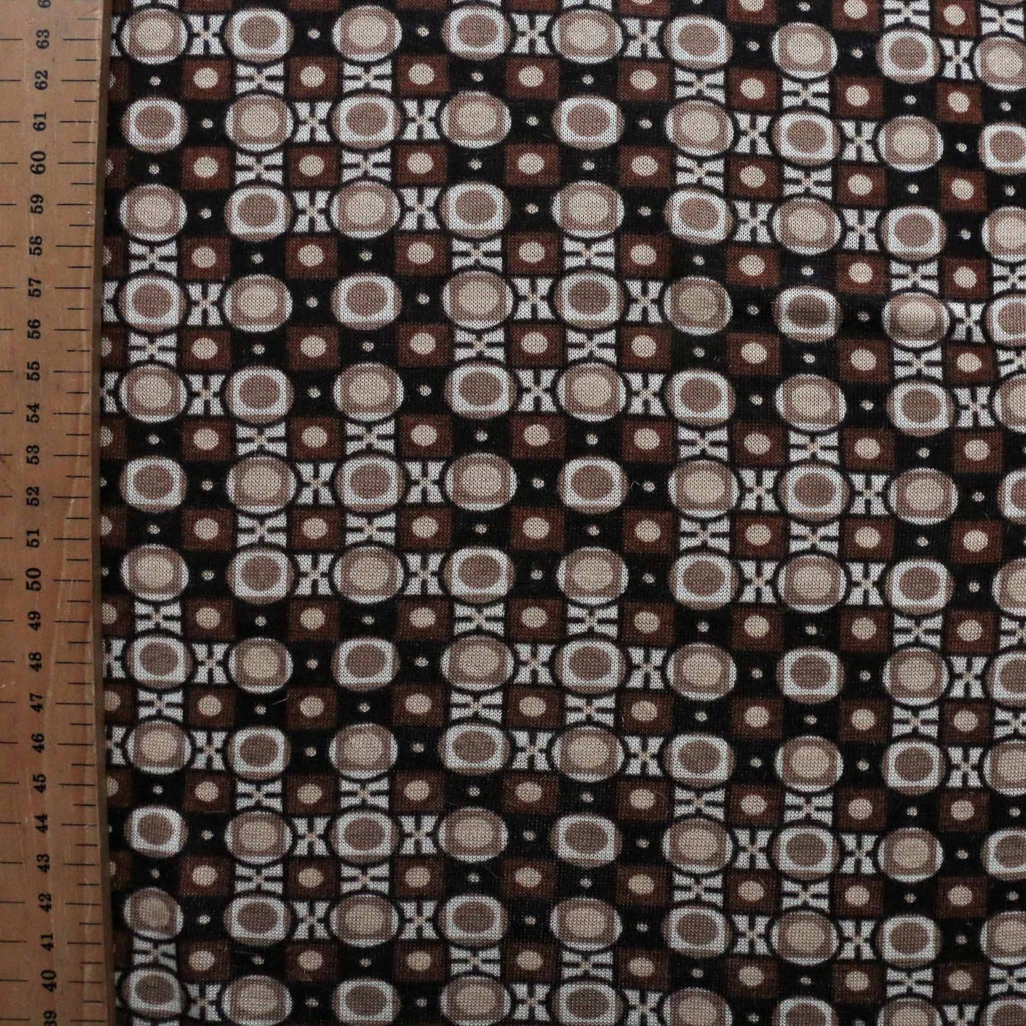 metre sustainable vintage jersey knit brown and black retro printed deadstock dressmaking fabric
