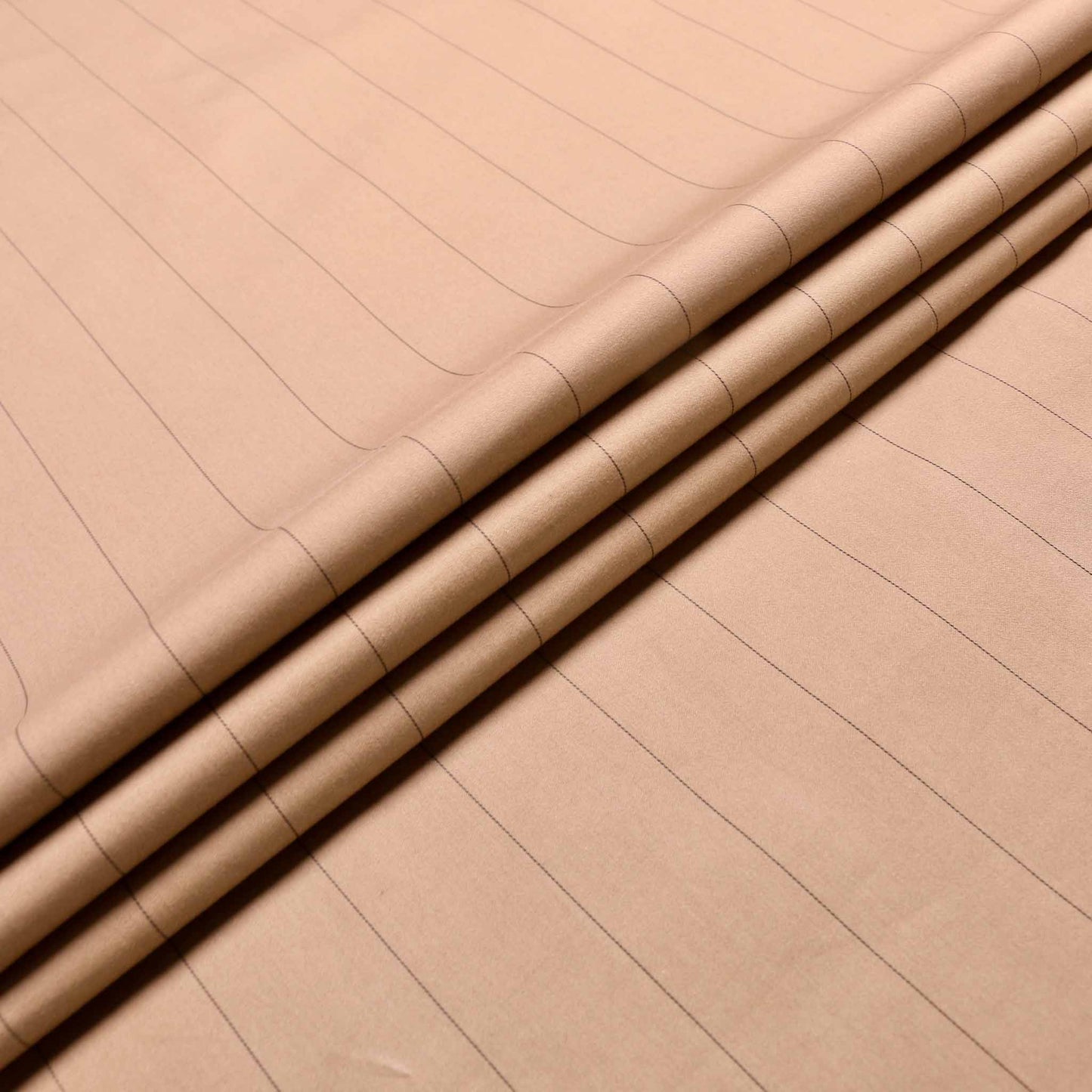 black pinstripe design on beige cotton sateen suiting fabric