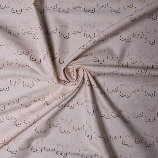 pure cotton dressmaking fabric with beige boobie print