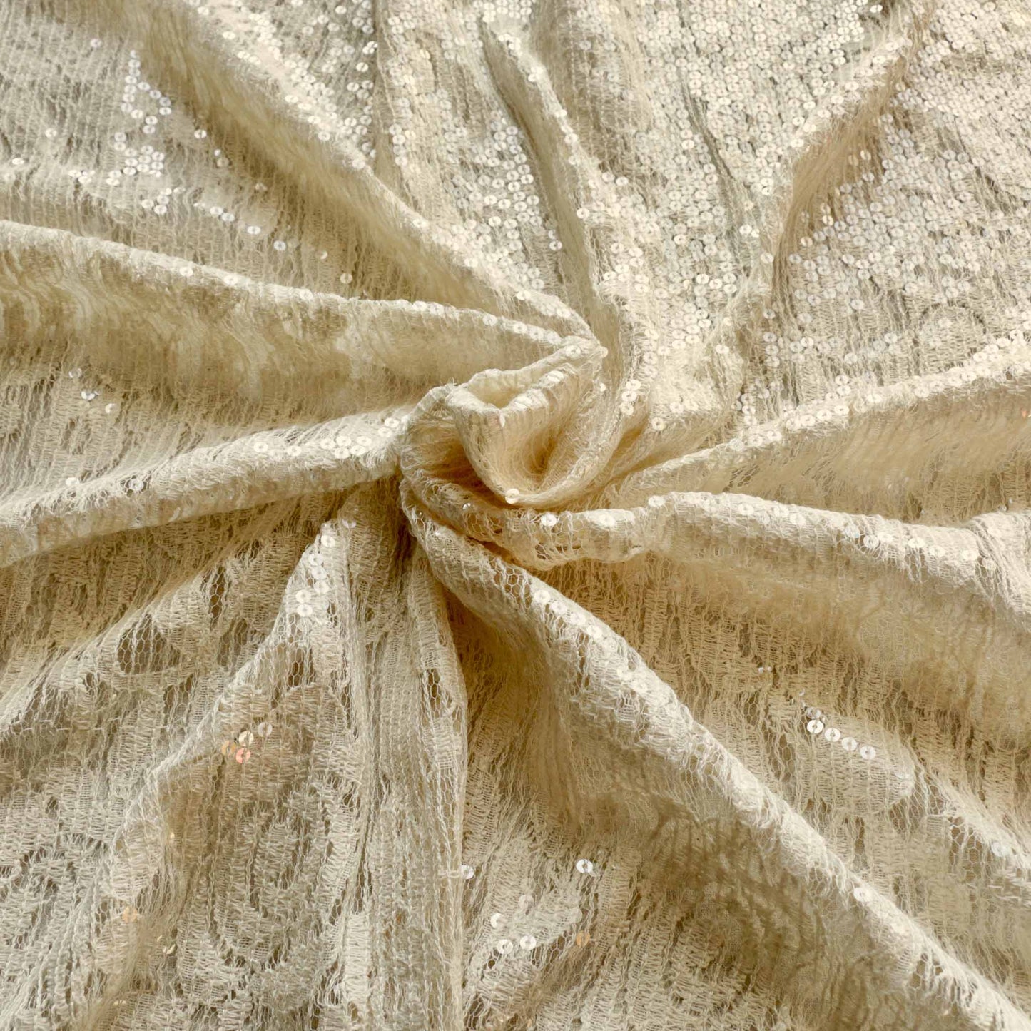 floral lace fabric with sequins in cream dressmaking fabric