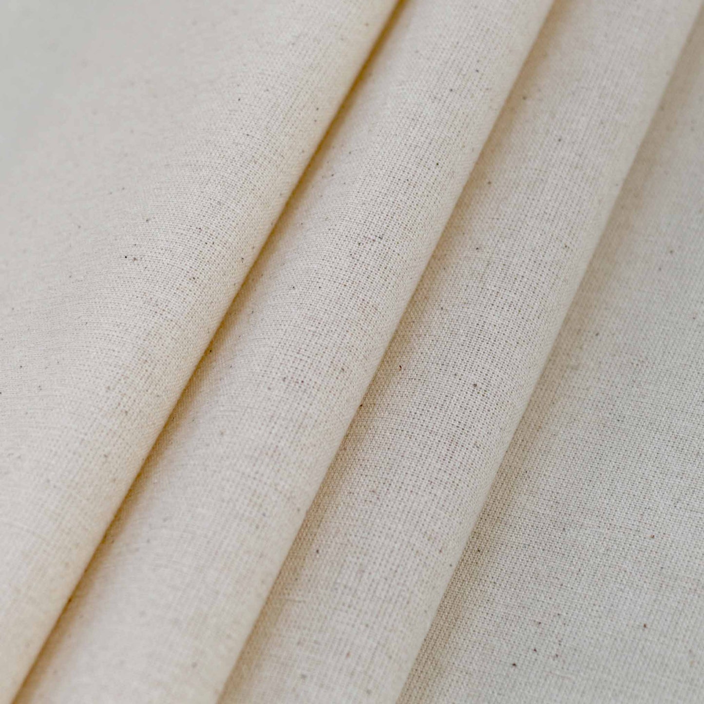 calico dressmaking fabric in natural cream colour