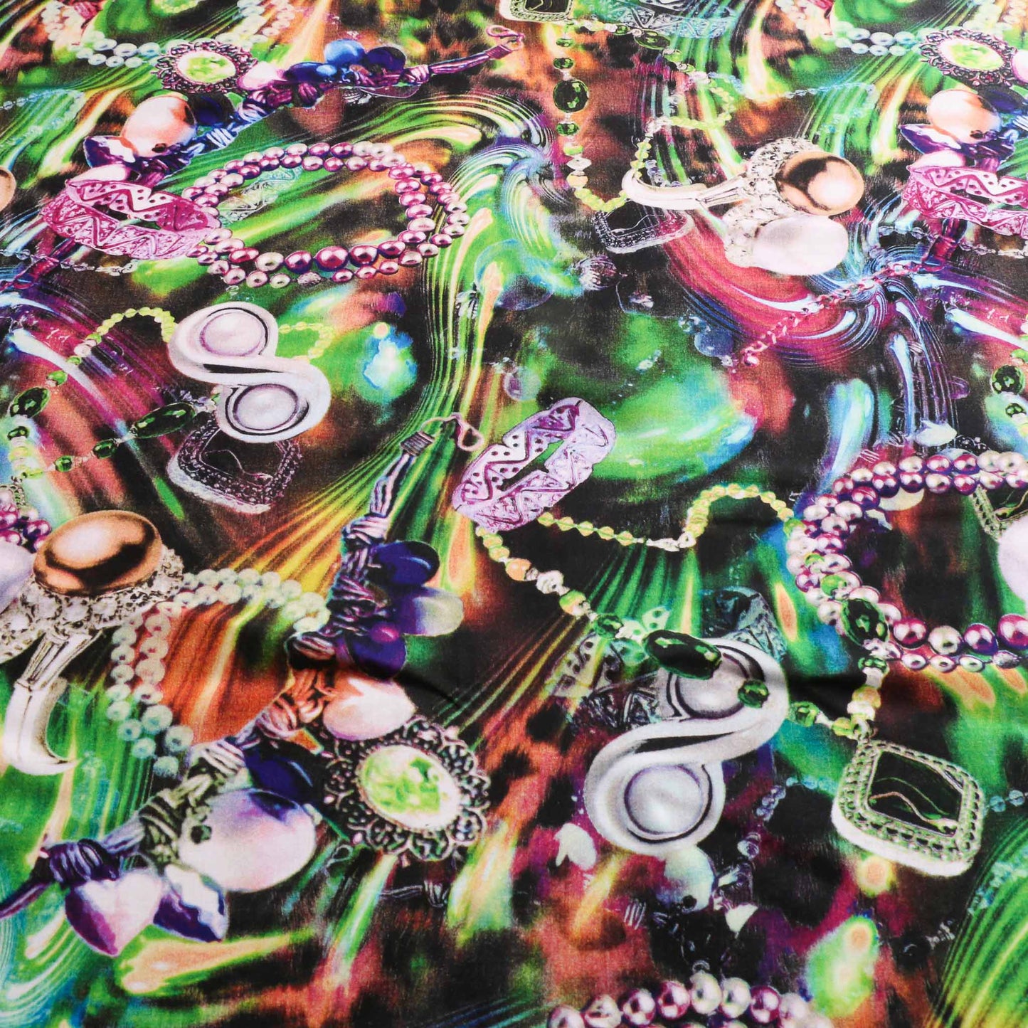 green viscose challis dressmaking rayon fabric with purple and blue printed jewellery design