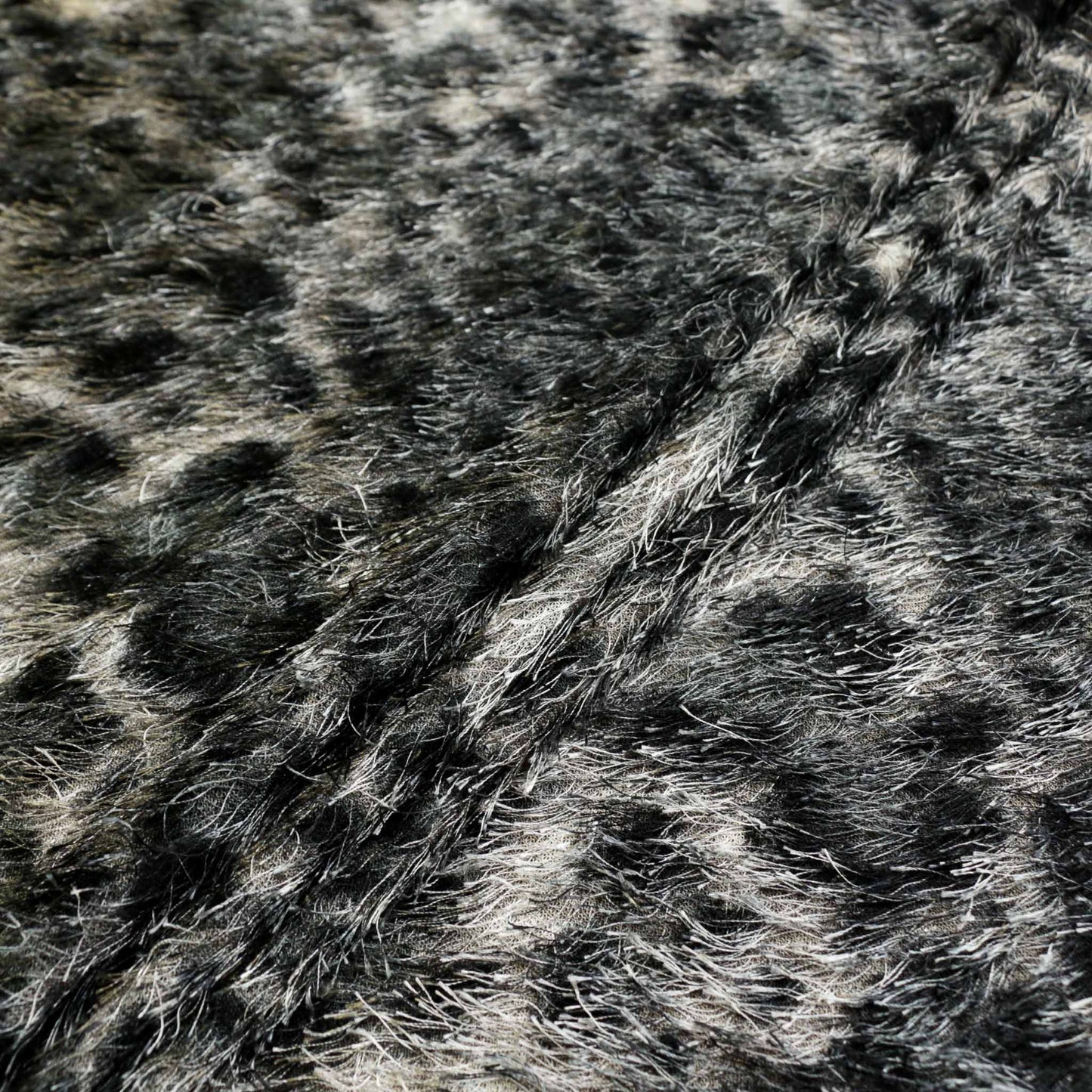 grey and black eyelash fabric jaguar print animal skin dressmaking fabric