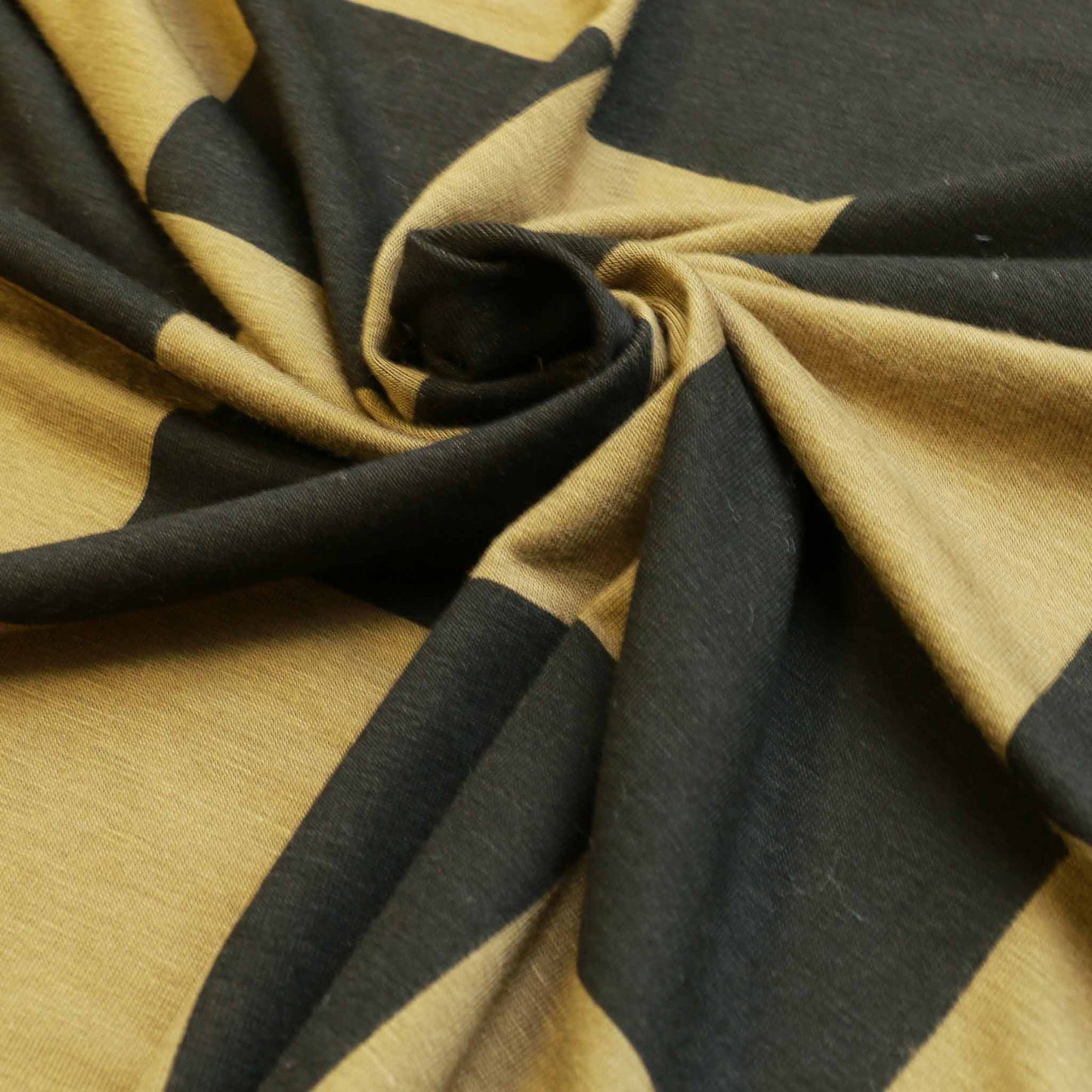 deadstock khaki green and black jersey viscose with large check pattern