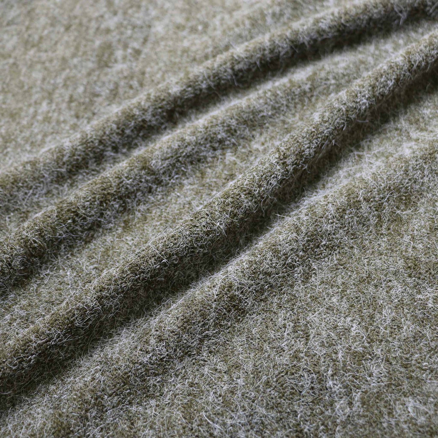 faux angora jersey khaki green colour dressmaking fabric