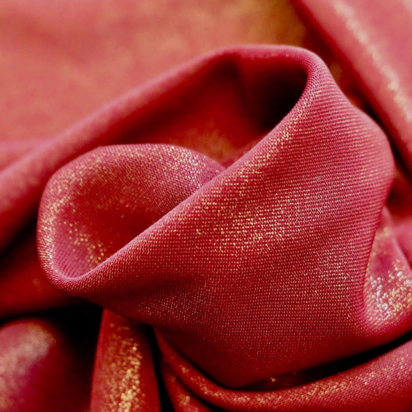 maroon lycra dressmaking fabric with gold shimmer
