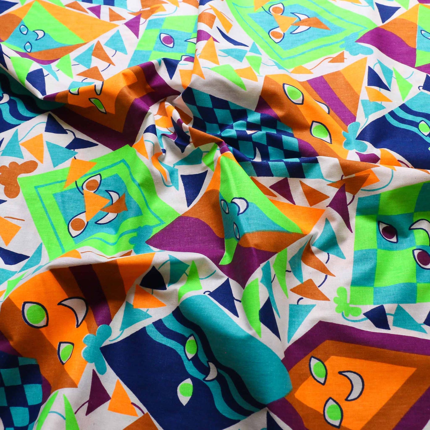 multicoloured retro cotton poplin deadstock sustainable fabric with printed kites pattern