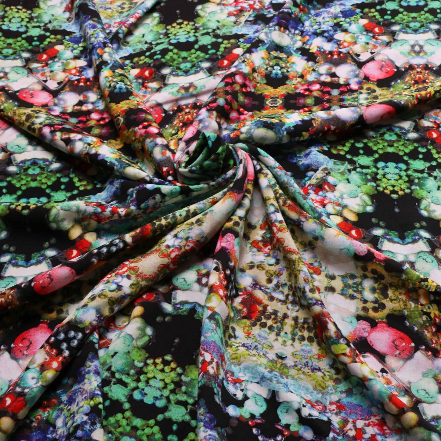 multicoloured abstract jewellery on black viscose challis fabric
