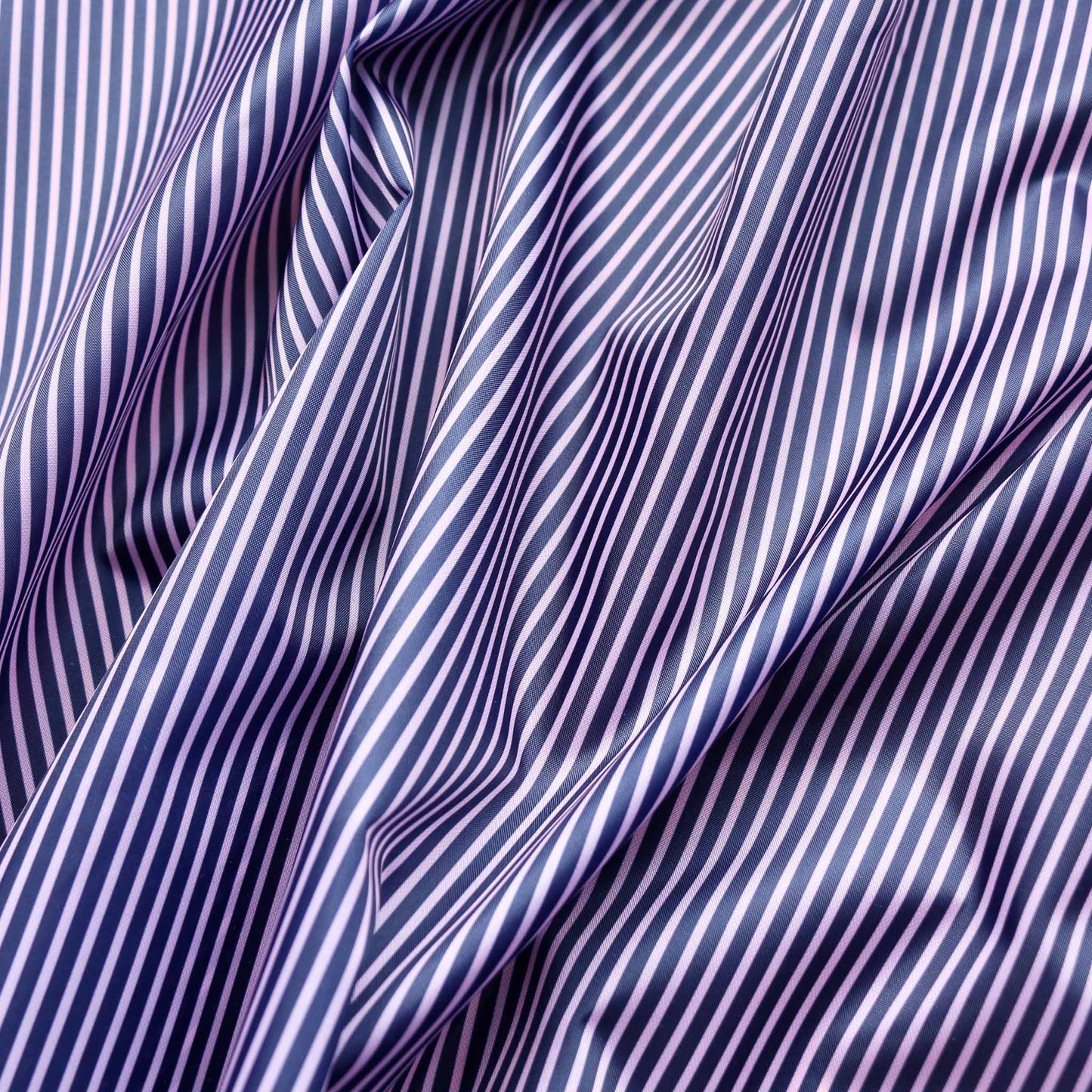 pink and navy polyester lining fabric with striped design