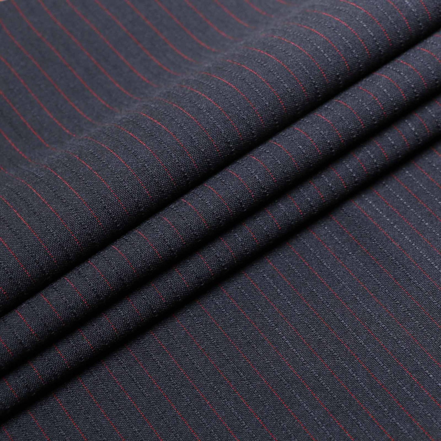 dark blue suiting dressmaking fabric with red pinstripe