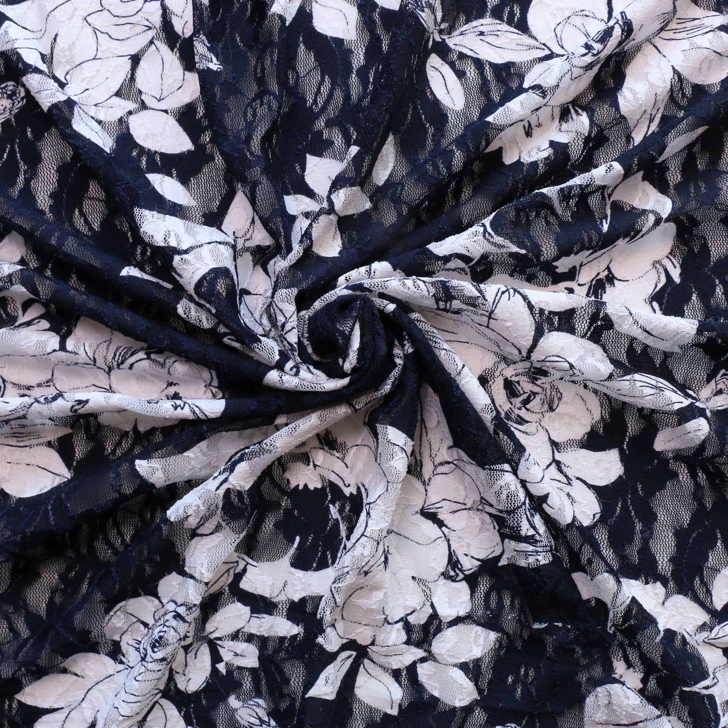 stretchy lace fabric for dressmaking in navy blue with white flowers