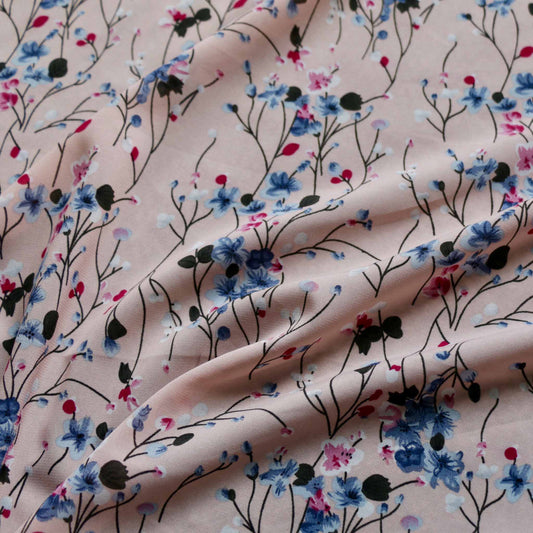 pink floral chiffon polyester dressmaking fabric with blue and purple flowers