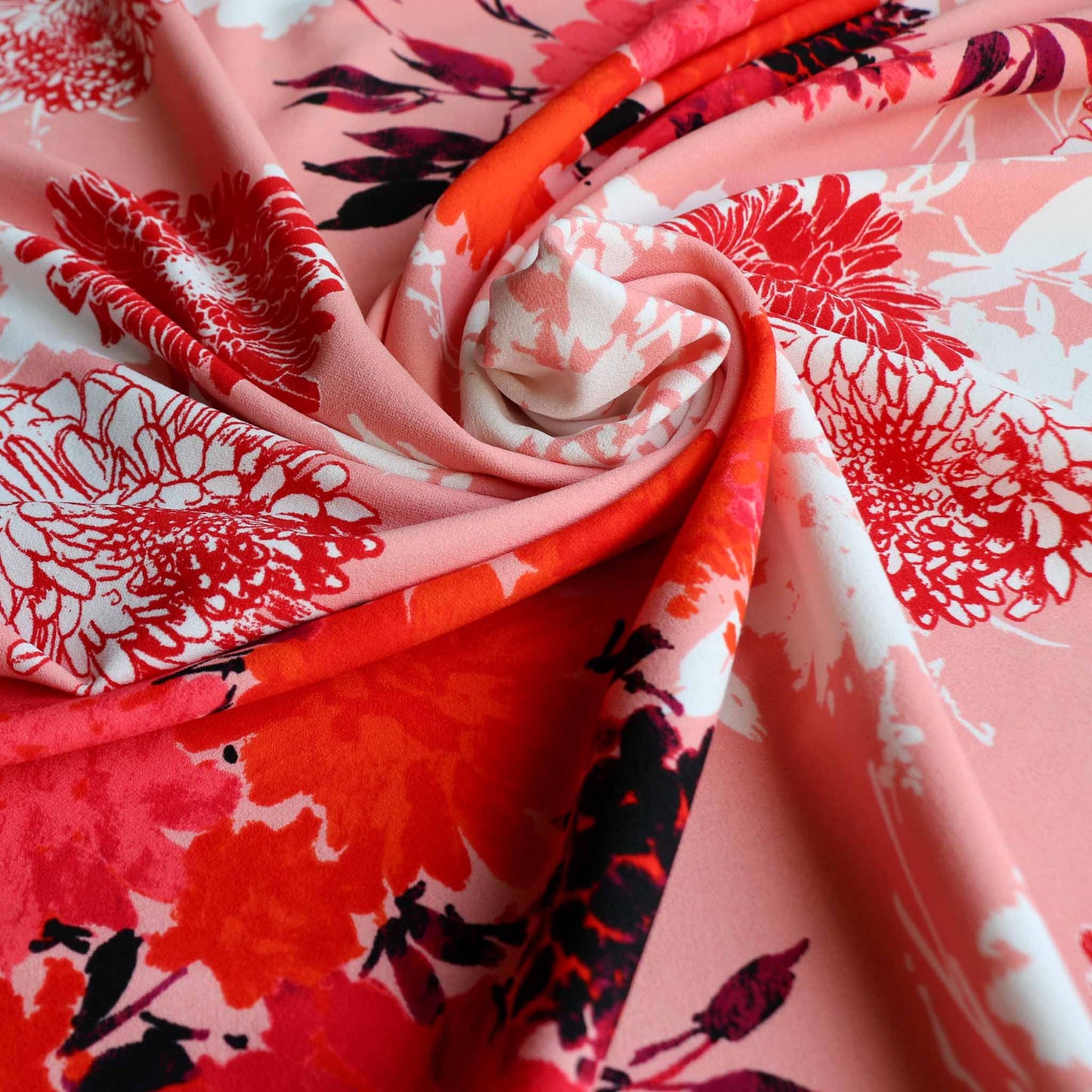 john kaldor dressmaking scuba fabric in pink with white and red floral pattern design