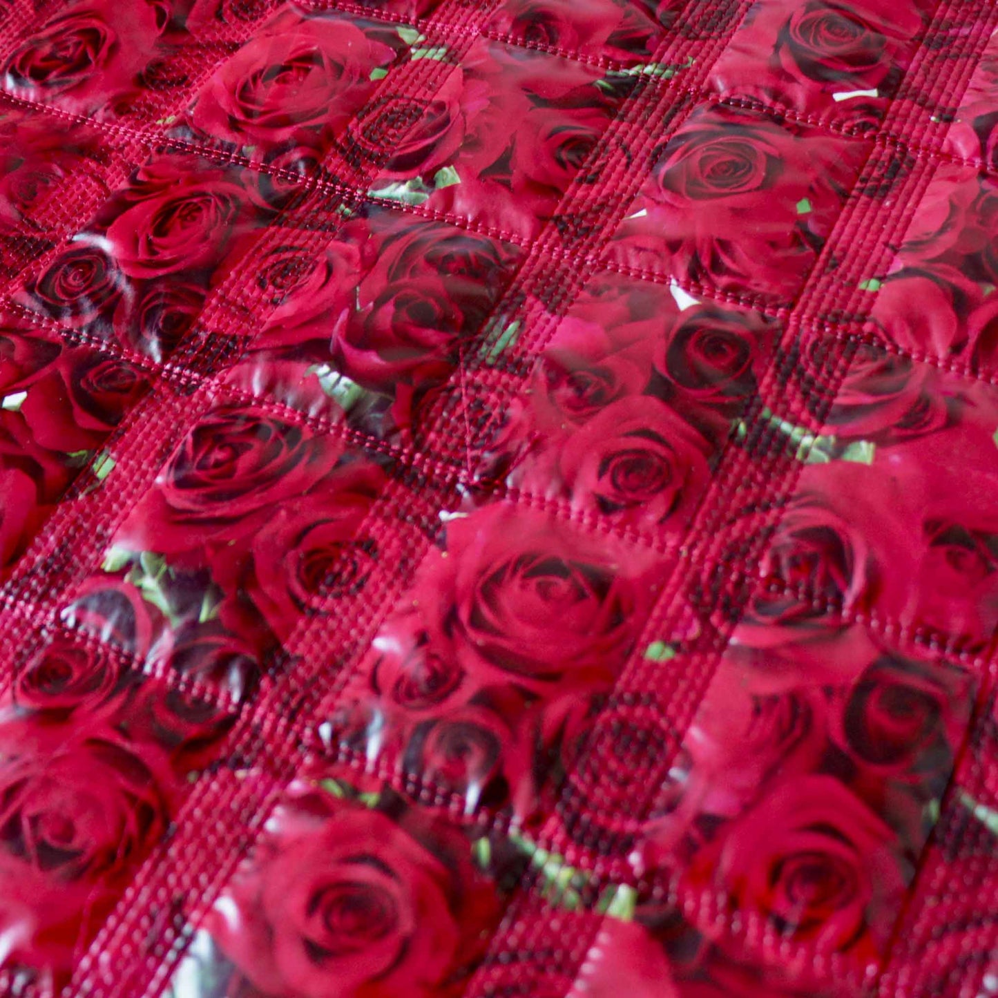 floral wadding quilting fabric for dressmaking in red with large roses printed