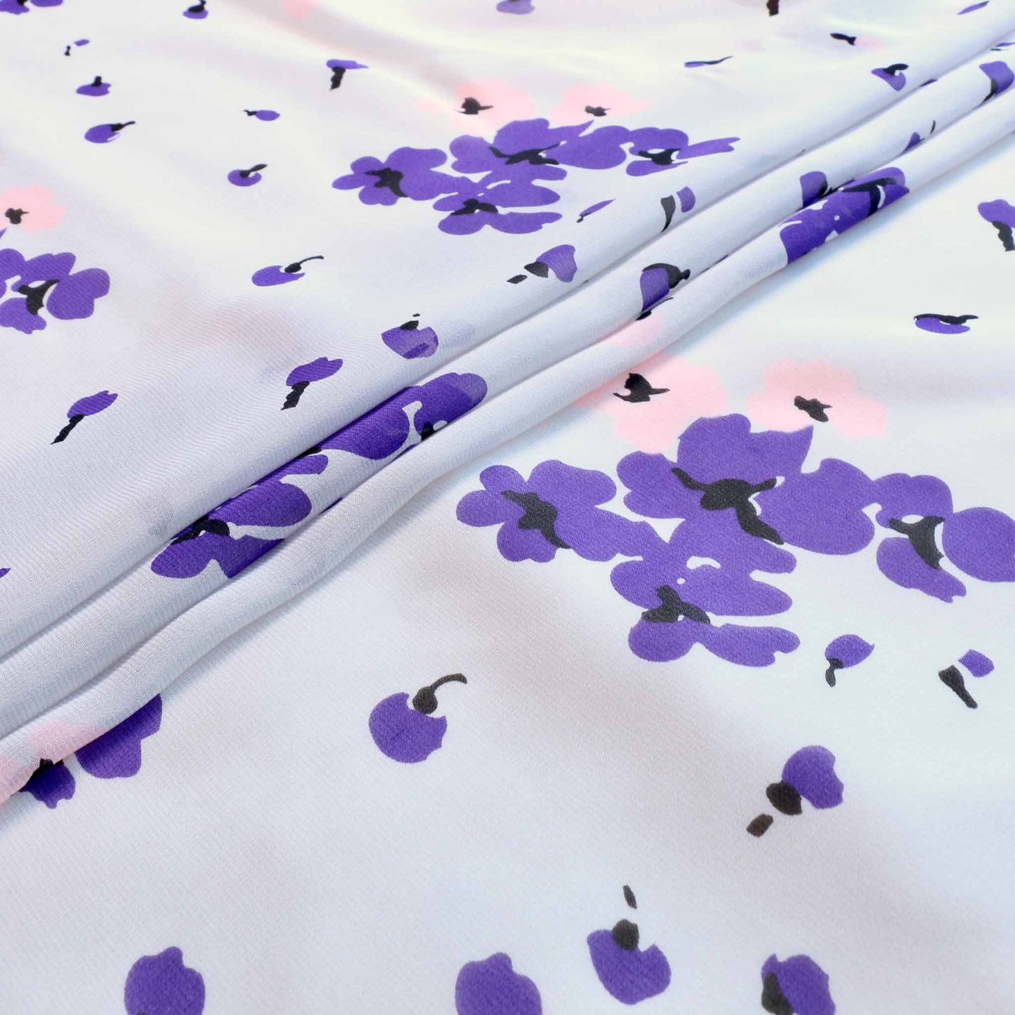 white silk chiffon dressmaking fabric with purple floral flower print