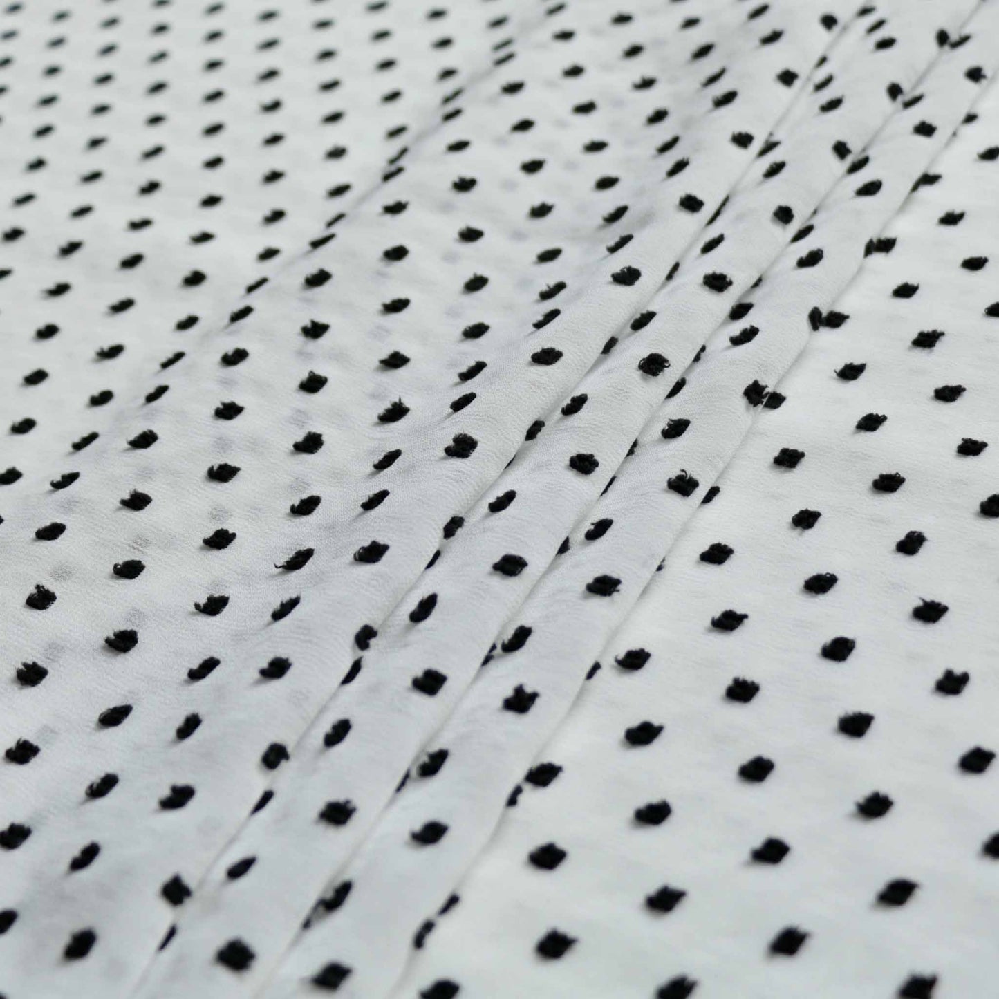 black and white swiss dot polka dot dobby chiffon dressmaking fabric