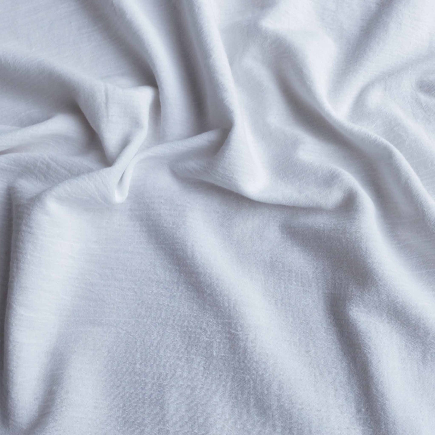 plain white cotton dressmaking fabric voile with crinkle texture