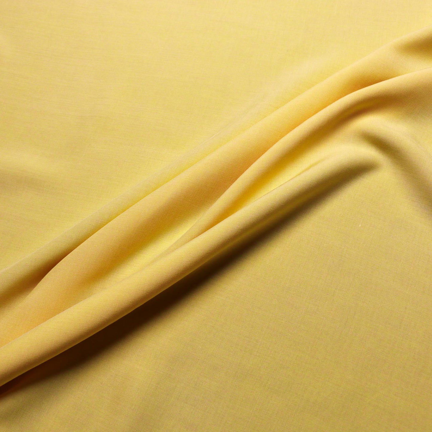 soft yellow viscose voile lawn dressmaking fabric uk