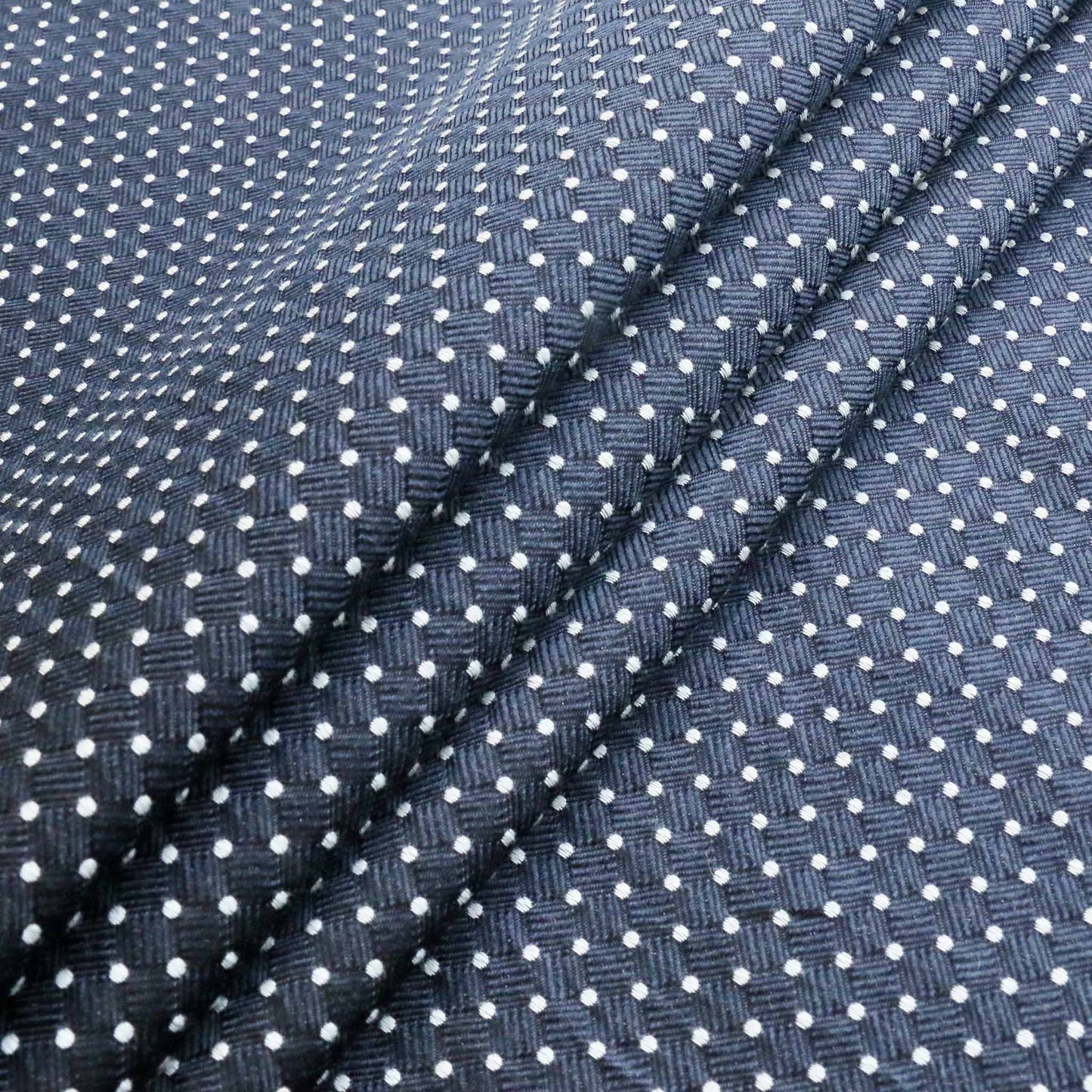 navy and white jacquard silk tie dot dressmaking fabric