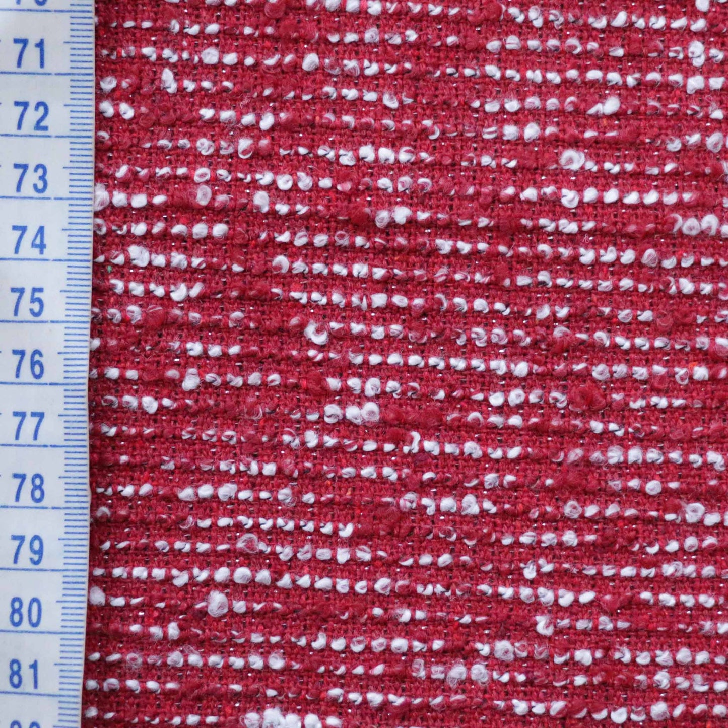 metre red wool blend boucle dressmaking fabric with silver lurex