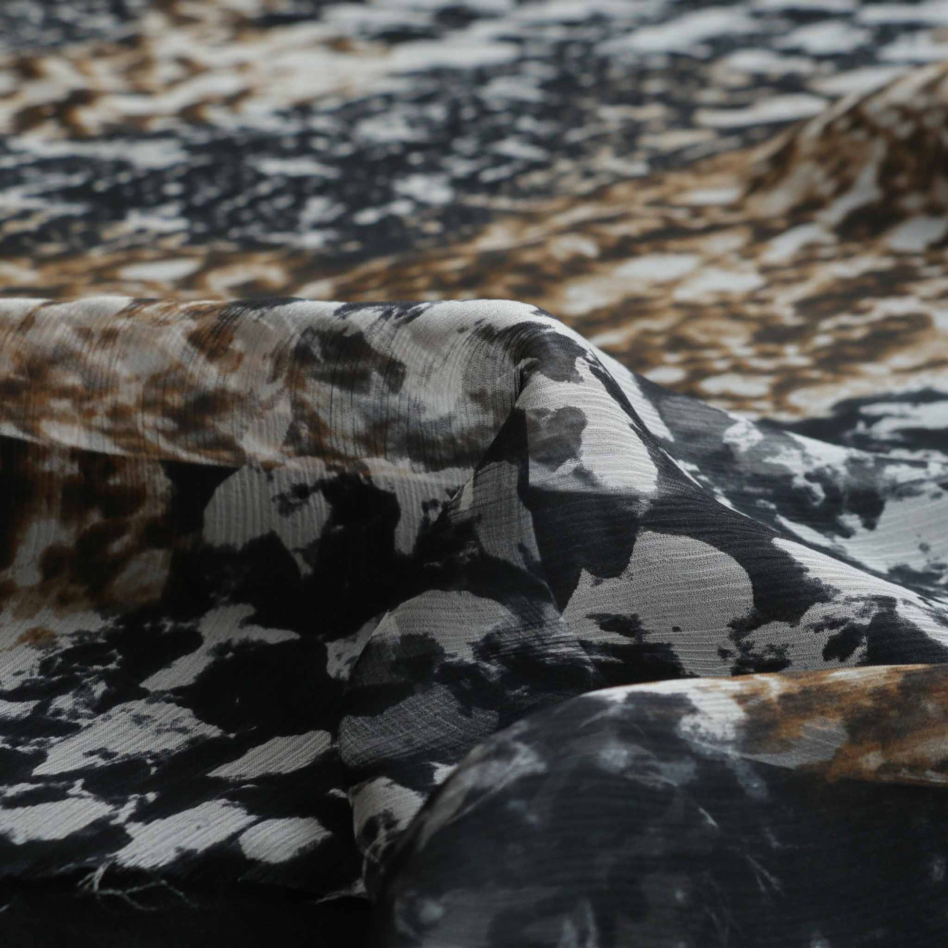 animal print silk chiffon dressmaking fabric in beige and black