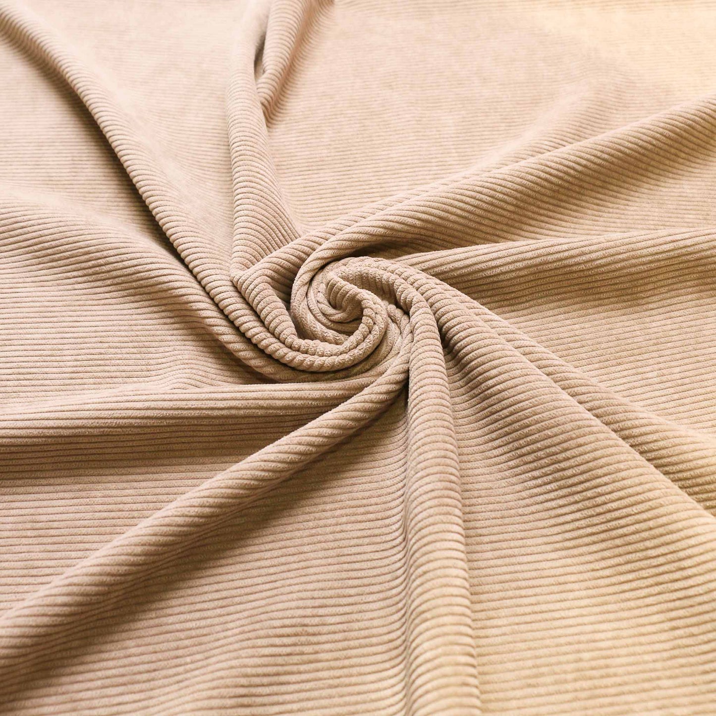 8 wale corduroy dressmaking fabric in beige